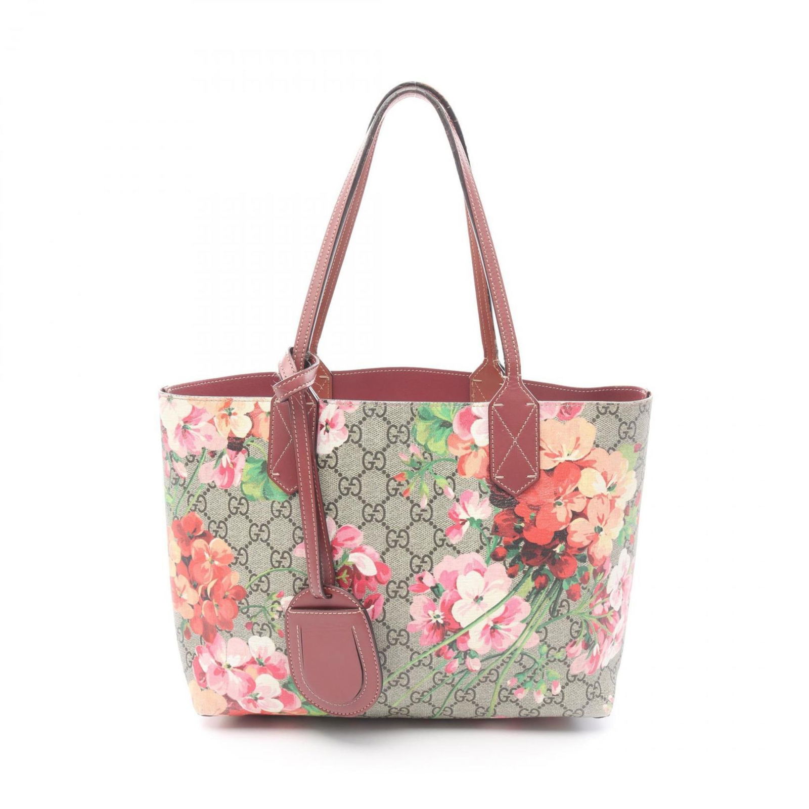 Canvas handbag with GG blooms pattern by Gucci beige: Canvas handbag with GG blooms pattern by Gucci beige This Gucci GG Blooms handbag features a beige canvas exterior with the signature floral pattern. Designed for women, it offers ample space and func