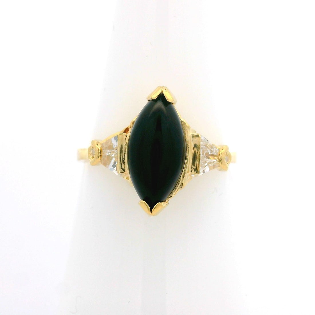 14k Yellow Gold Cocktail Ring with Black Onyx and Cubic Zirconia: 14k Yellow Gold Cocktail Ring with Black Onyx and Cubic Zirconia This exquisite cocktail ring features a stunning 14k yellow gold band, adorned with a striking marquise cabochon black onyx stone and s