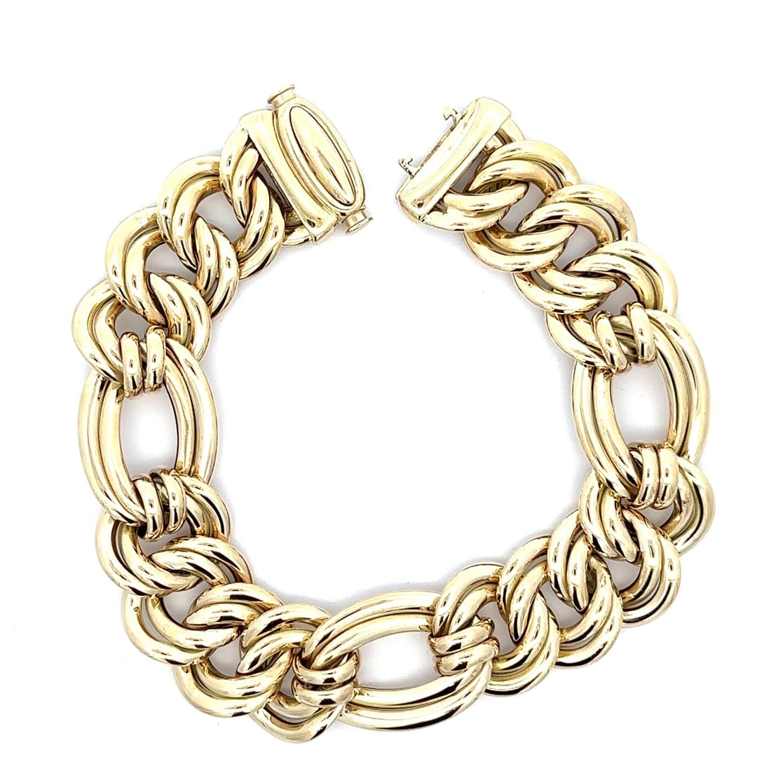 Italian 14k Yellow Gold Wide Puff Interlocking Figaro Link Bracelet: Italian 14k Yellow Gold Wide Puff Interlocking Figaro Link Bracelet This exquisite bracelet features a wide, puffed design with interlocking dual fancy Figaro links, crafted from solid 14k yellow gold