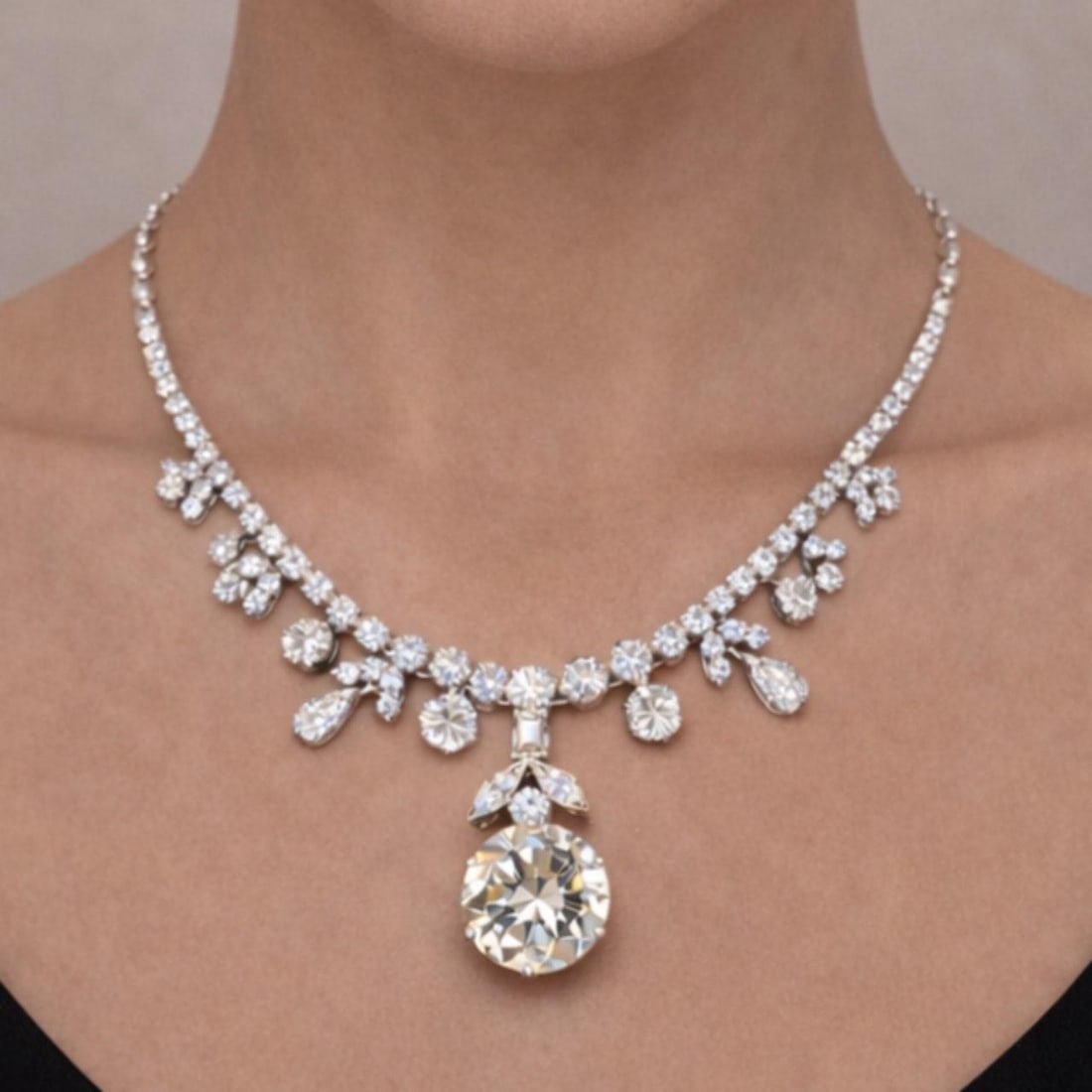 GIA Certified Diamond Necklace in 18K White Gold with 37.31 Carats Total: GIA Certified Diamond Necklace in 18K White Gold with 37.31 Carats Total This 18K white gold necklace features a total diamond weight of 37.31 carats. The centerpiece is a 10.01 carat GIA certified ro