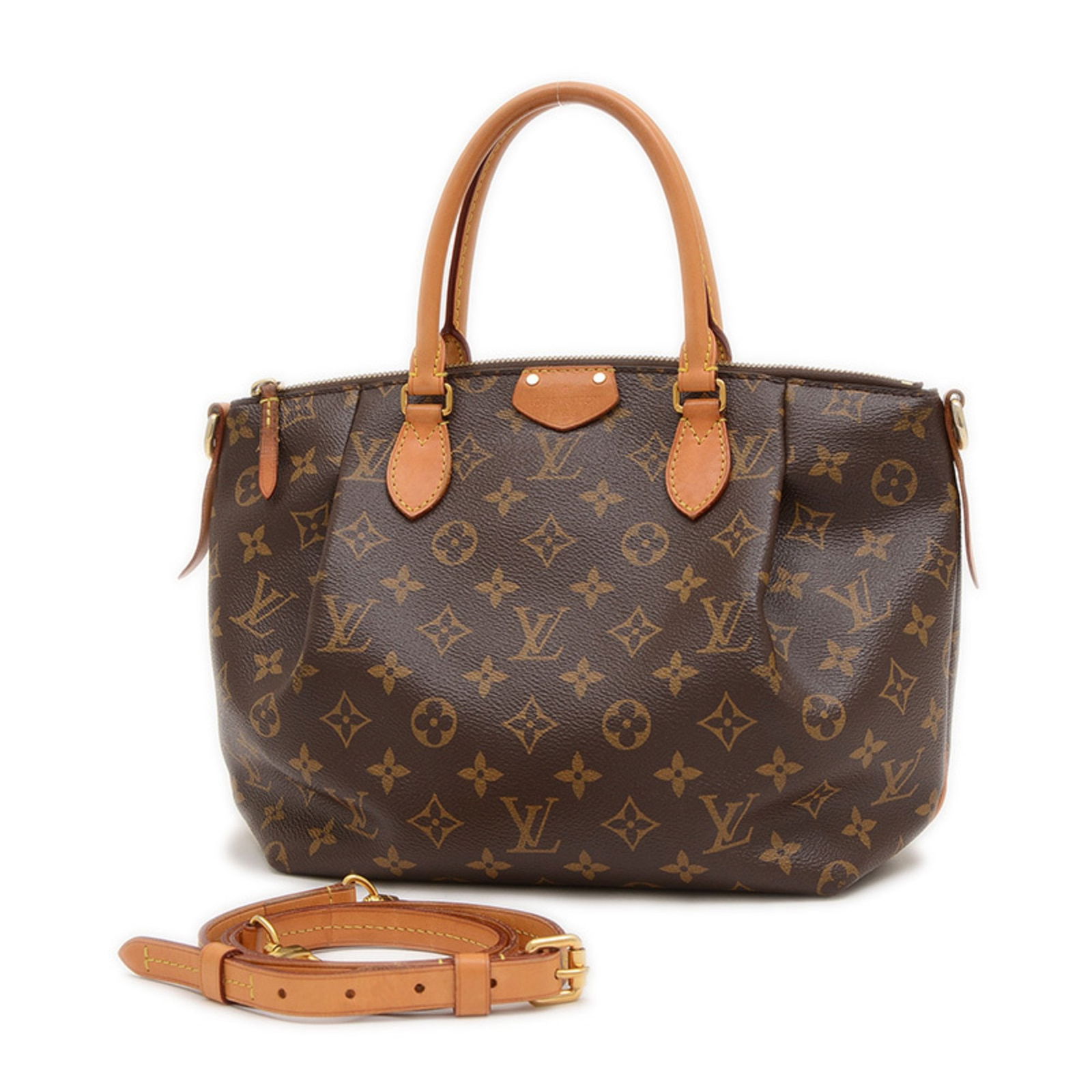 Louis Vuitton Turenne Brown Canvas Handbag France: Louis Vuitton Turenne Brown Canvas Handbag France The Louis Vuitton Turenne is a women's handbag crafted from brown canvas. It features a spacious interior and classic design. The bag shows traces of