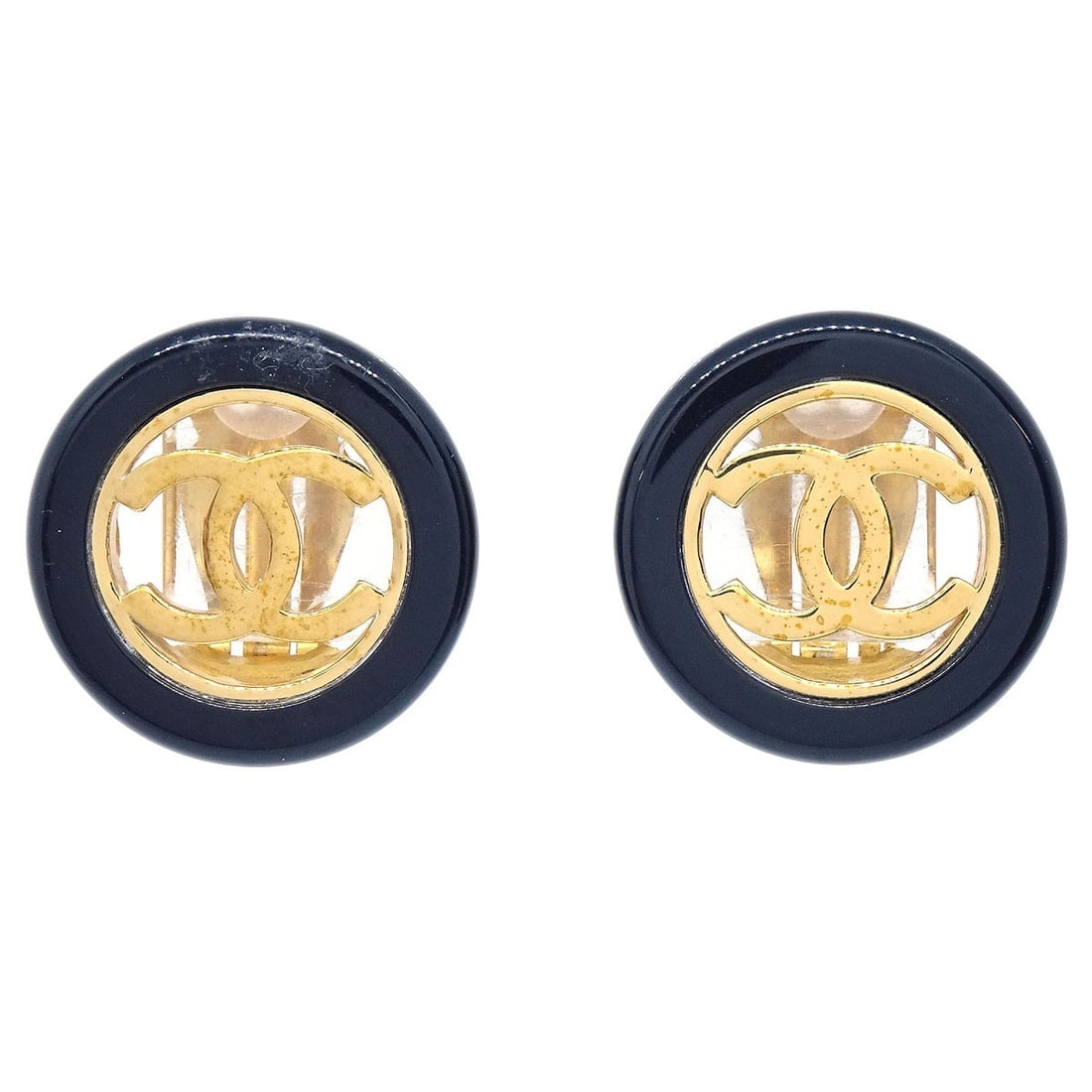 Chanel 97A Gold Plated Black Round Button Clip-On Earrings: Chanel 97A Gold Plated Black Round Button Clip-On Earrings These Chanel button clip-on earrings feature a round shape with a stylish black and gold color combination. Crafted from gold-plated material