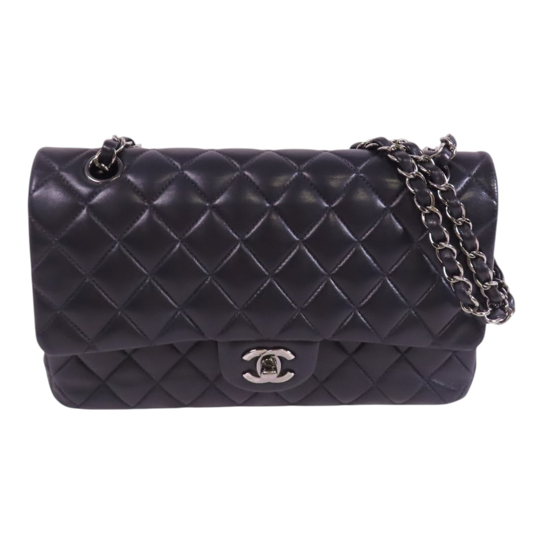 CHANEL Classic 25 Navy Lambskin Leather Shoulder Bag SHW: CHANEL Classic 25 Navy Lambskin Leather Shoulder Bag SHW This classic Chanel shoulder bag is crafted from luxurious navy lambskin leather, providing both elegance and durability. The bag features a st
