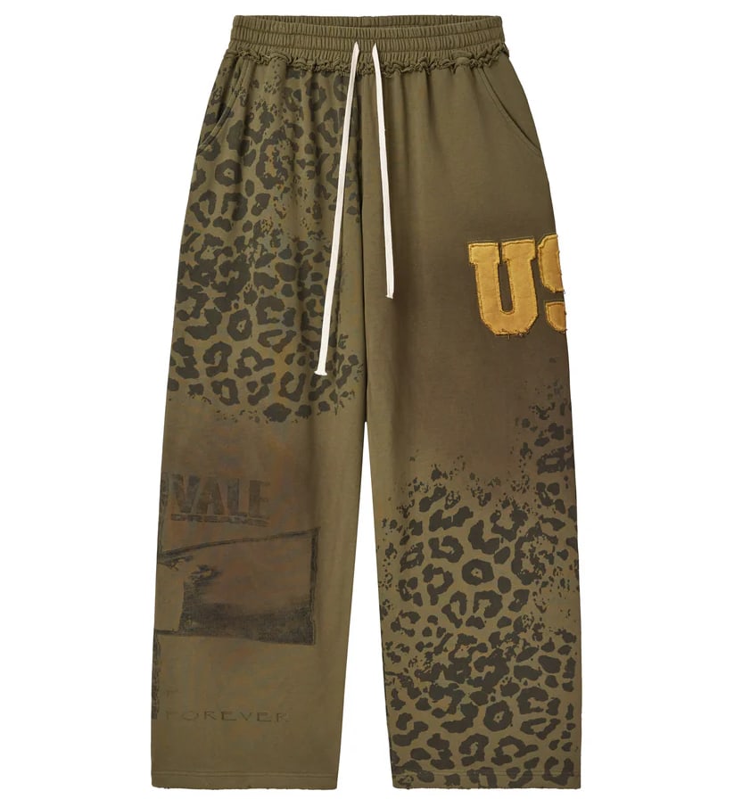 Safari Olive Cotton-Blend Fleece Sweatpants by Vale in Medium: Safari Olive Cotton-Blend Fleece Sweatpants by Vale in Medium The Vale Safari Olive Sweatpants offer a balance of relaxed comfort and everyday style. These sweatpants feature a wide leg fit and are ma