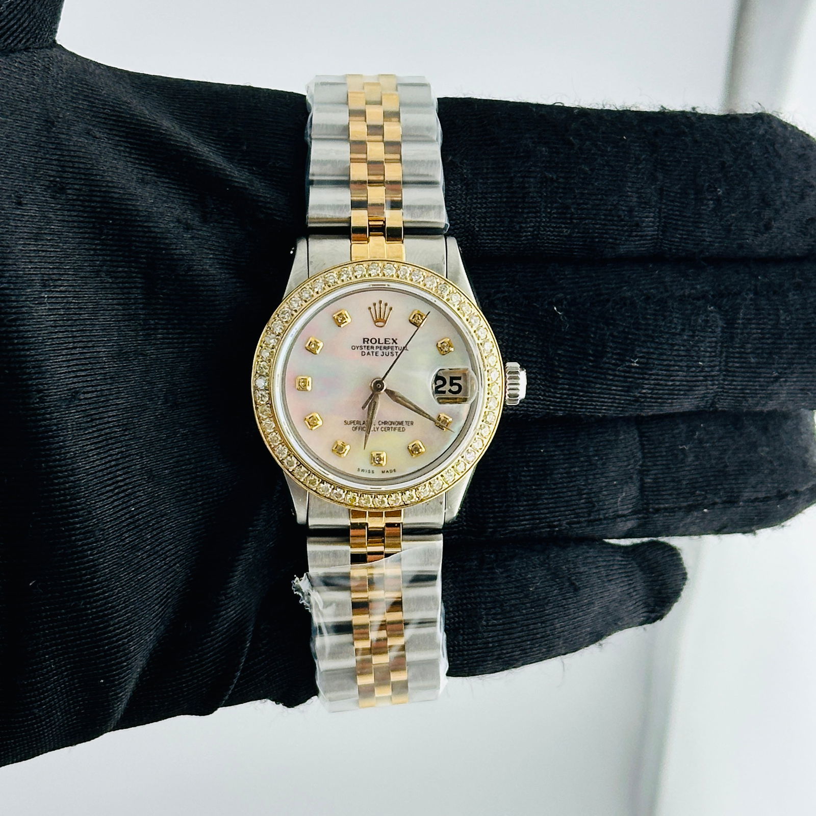 Rolex Ref 6466 Datejust Ladies Aftermarket White MOP Diamond Dial Jubilee Watch: Rolex Ref 6466 Datejust Ladies Aftermarket White MOP Diamond Dial Jubilee Watch This ladies Rolex Datejust features an aftermarket white mother-of-pearl diamond dial and an aftermarket Jubilee bracele