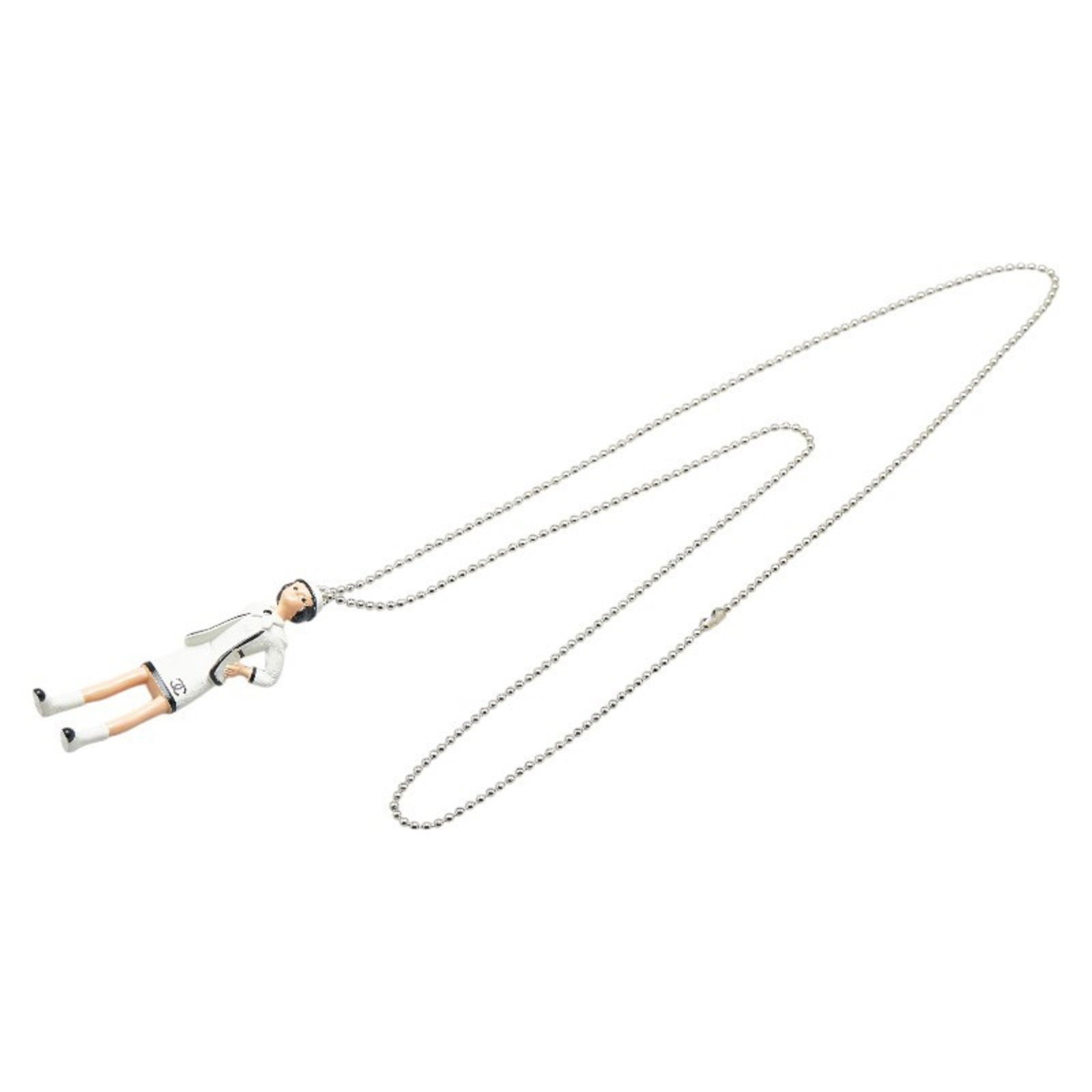 Mademoiselle White Metal Pendant Necklace by Chanel France: Mademoiselle White Metal Pendant Necklace by Chanel France This Chanel Mademoiselle necklace features a white metal construction and an elegant pendant design. Designed for women, it is crafted in Fra