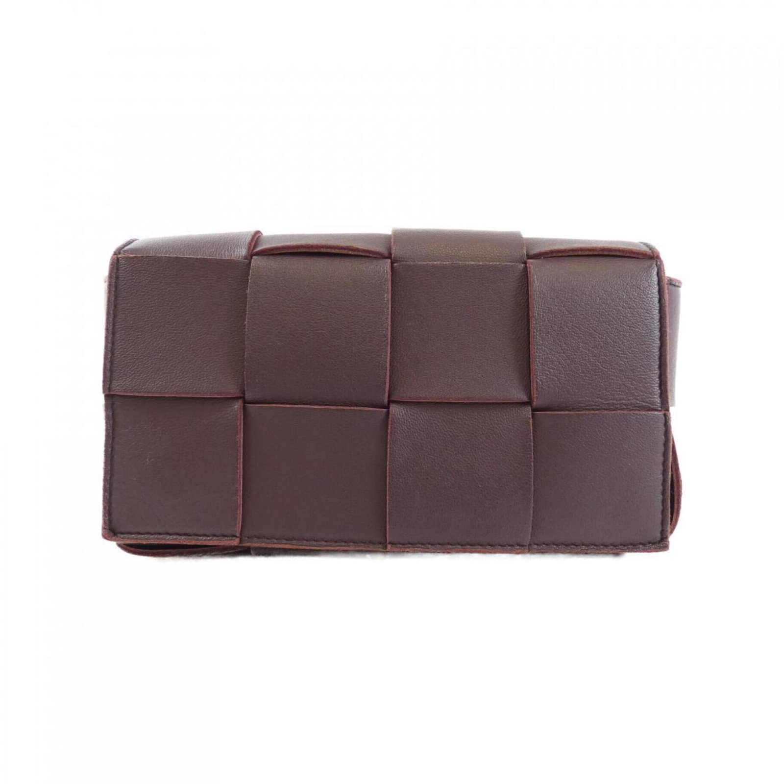 Burgundy Leather Cassette Bag by Bottega Veneta Italy: Burgundy Leather Cassette Bag by Bottega Veneta Italy This Bottega Veneta Cassette bag is crafted from burgundy leather and features an adjustable strap. The bag is designed for women and was made in