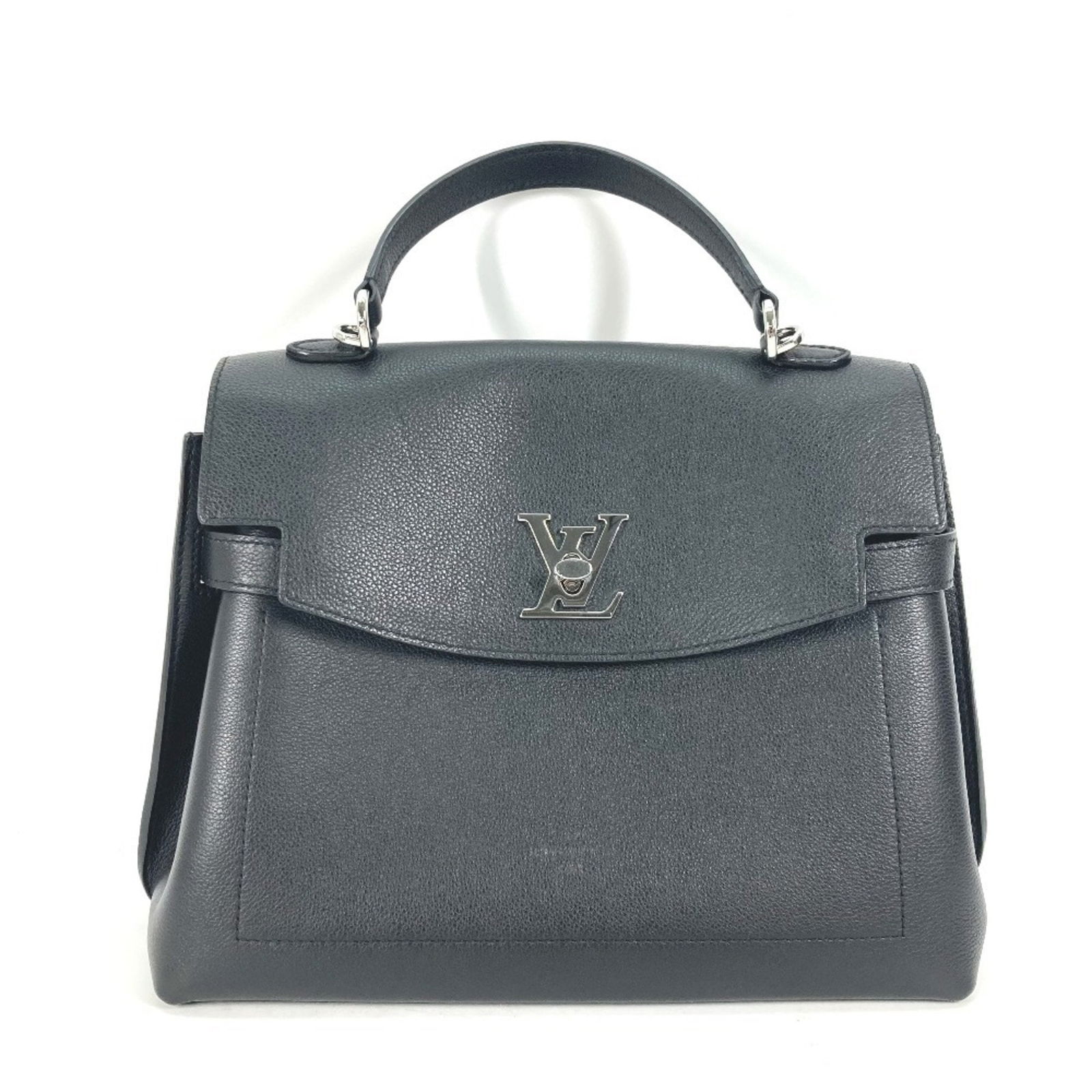 Black Leather Lockme Ever MM Handbag by Louis Vuitton: Black Leather Lockme Ever MM Handbag by Louis Vuitton This Louis Vuitton Lockme Ever MM handbag is crafted from black leather and made in France. Designed for women, it features a spacious interior. T