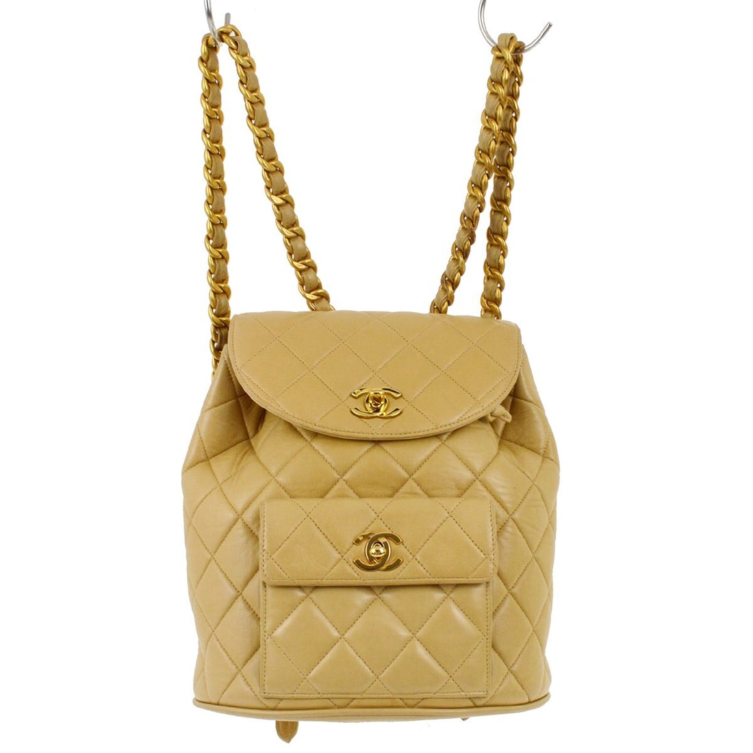 Chanel Duma Beige Lambskin Large Backpack with Turn Lock: Chanel Duma Beige Lambskin Large Backpack with Turn Lock Introducing the Chanel Beige Lambskin Large Duma Backpack, a blend of luxury and functionality. This stylish backpack is crafted from exquisite