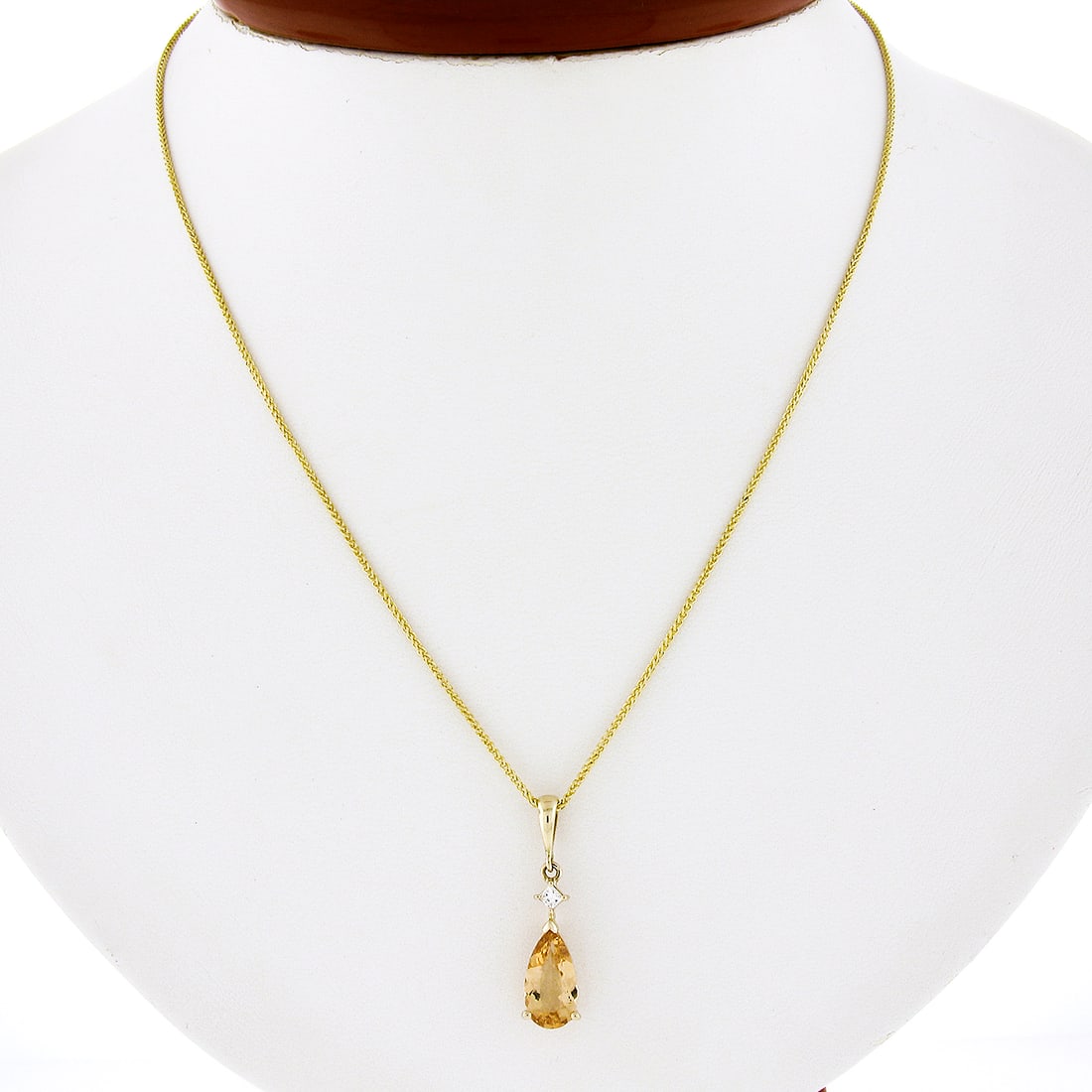 14k Yellow Gold 1.56ctw Pear Imperial Topaz Diamond Teardrop Pendant with 18" Chain: 14k Yellow Gold 1.56ctw Pear Imperial Topaz Diamond Teardrop Pendant with 18" Chain This stunning pendant and chain necklace features a beautifully crafted teardrop dangle design, made from solid 14k