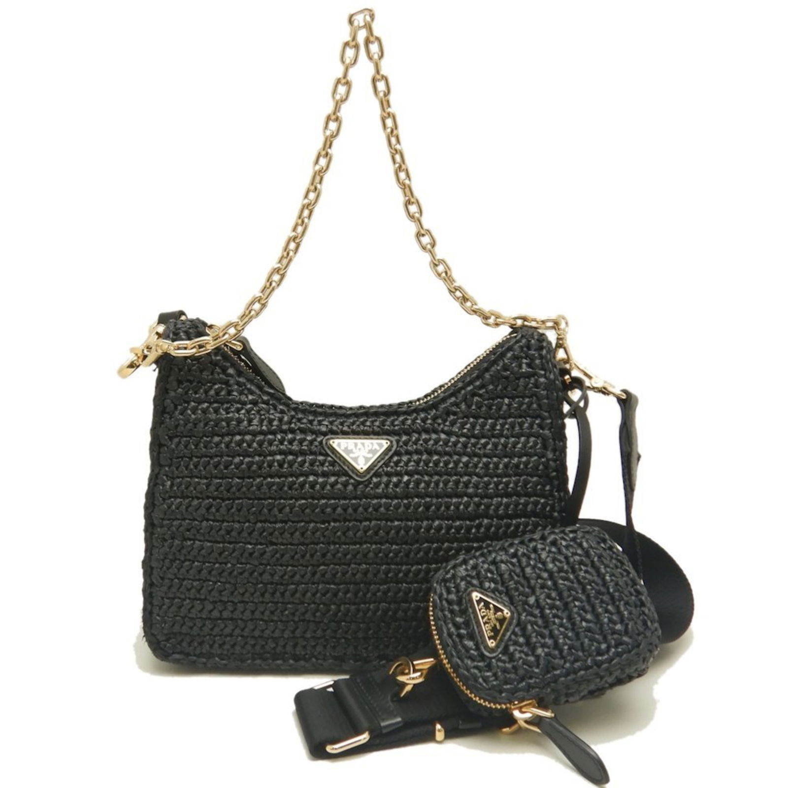 Wicker Black Handbag Prada Re-edition Model from Italy: Wicker Black Handbag Prada Re-edition Model from Italy This Prada Re-edition handbag features a black wicker construction and is designed for women. The bag is crafted in Italy and showcases subtle tr
