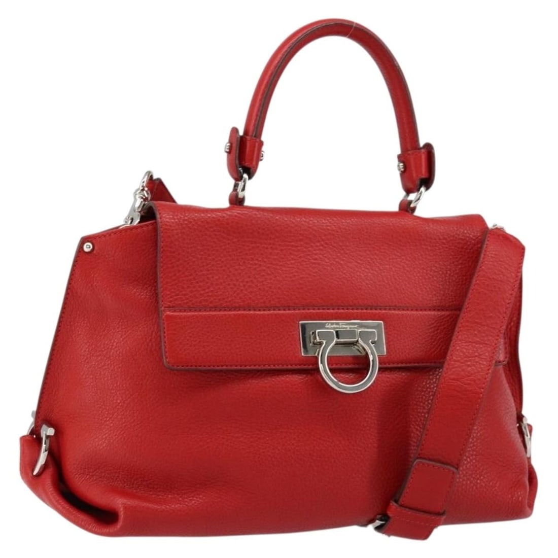 Salvatore Ferragamo Red Leather Gancini Hand Bag with Shoulder Strap: Salvatore Ferragamo Red Leather Gancini Hand Bag with Shoulder Strap This authentic Salvatore Ferragamo Gancini Hand Bag is a sophisticated accessory crafted in Italy from high-quality leather. The st
