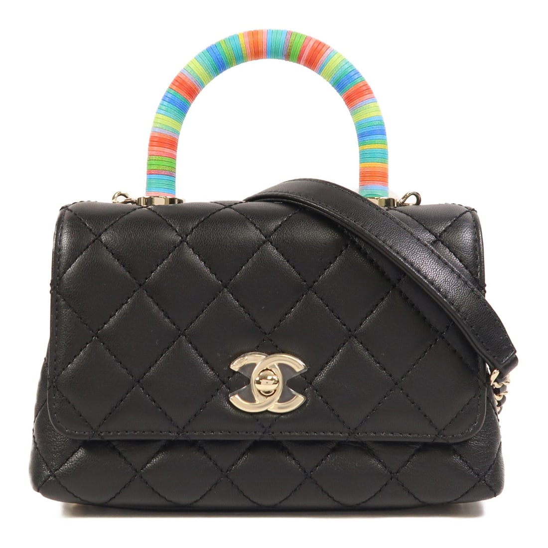 Black Lambskin Mini Coco Handle 2way Bag with Gold Hardware by CHANEL: Black Lambskin Mini Coco Handle 2way Bag with Gold Hardware by CHANEL This CHANEL Mini Coco Handle 2 Way Shoulder Bag features black lambskin leather and gold tone hardware. Designed for versatility,