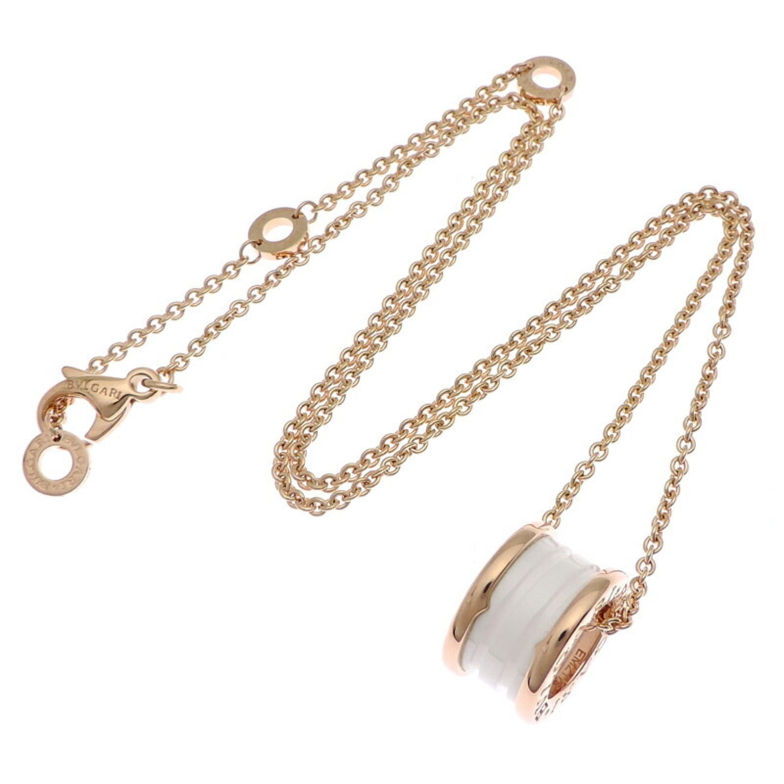 Bulgari B Zero 18K Pink Gold and Ceramic Pendant Necklace 45cm: Bulgari B Zero 18K Pink Gold and Ceramic Pendant Necklace 45cm This Bulgari B ZERO necklace features a pendant crafted from 18K rose gold and ceramic. Designed for a unisex audience, it showcases a re