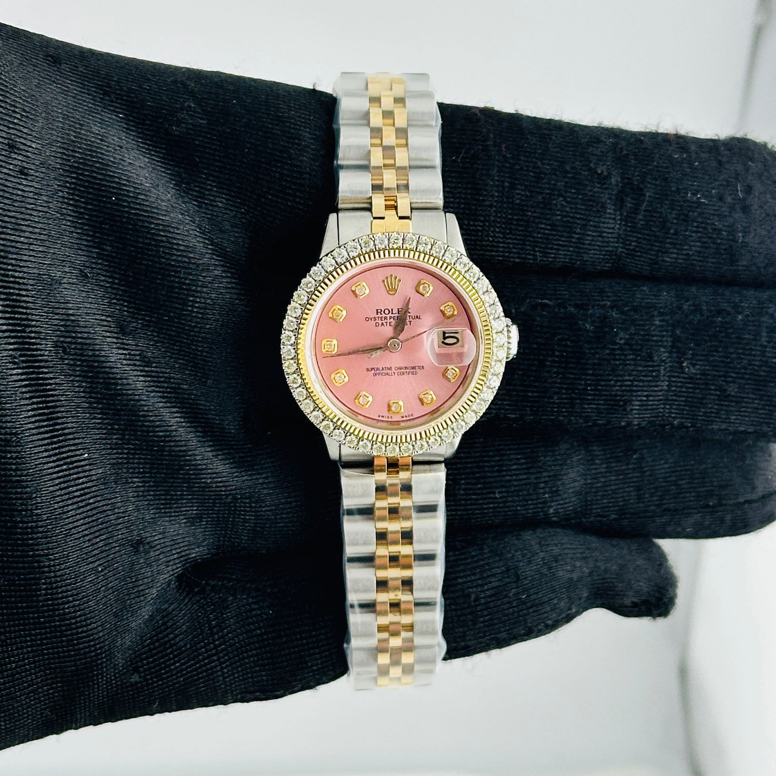 Ladies Rolex Datejust Ref 6519 Aftermarket Pink Diamond Dial Jubilee Bracelet: Ladies Rolex Datejust Ref 6519 Aftermarket Pink Diamond Dial Jubilee Bracelet This ladies Rolex Datejust features an aftermarket pink diamond dial and a prong-plated diamond bezel. The watch is fitted
