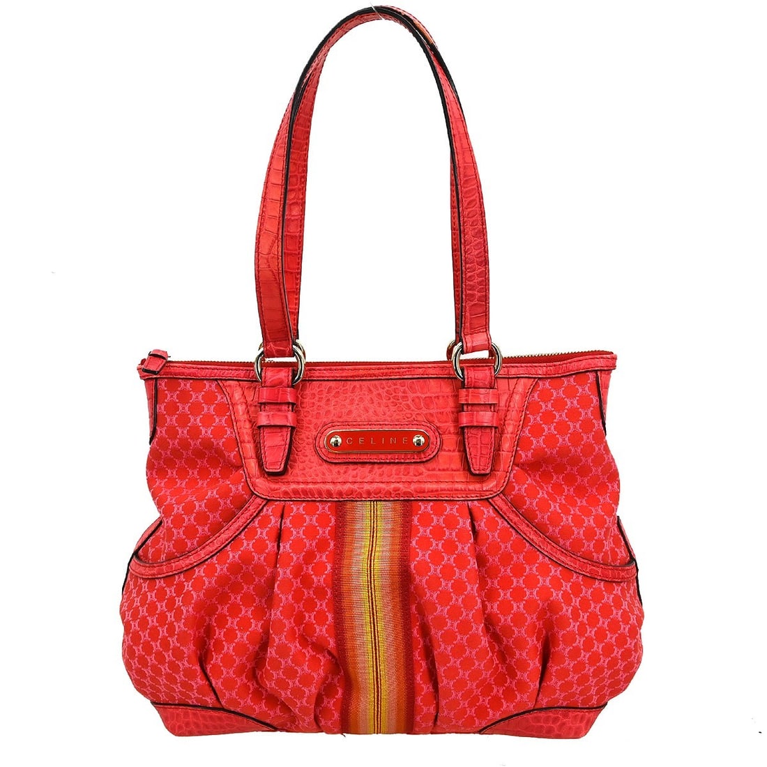 CELINE Macadam Canvas Tote in Red and Pink with Logo Accents: CELINE Macadam Canvas Tote in Red and Pink with Logo Accents This CELINE Macadam tote handbag features a red and pink canvas exterior with the iconic logo pattern. Designed with double handles and a z