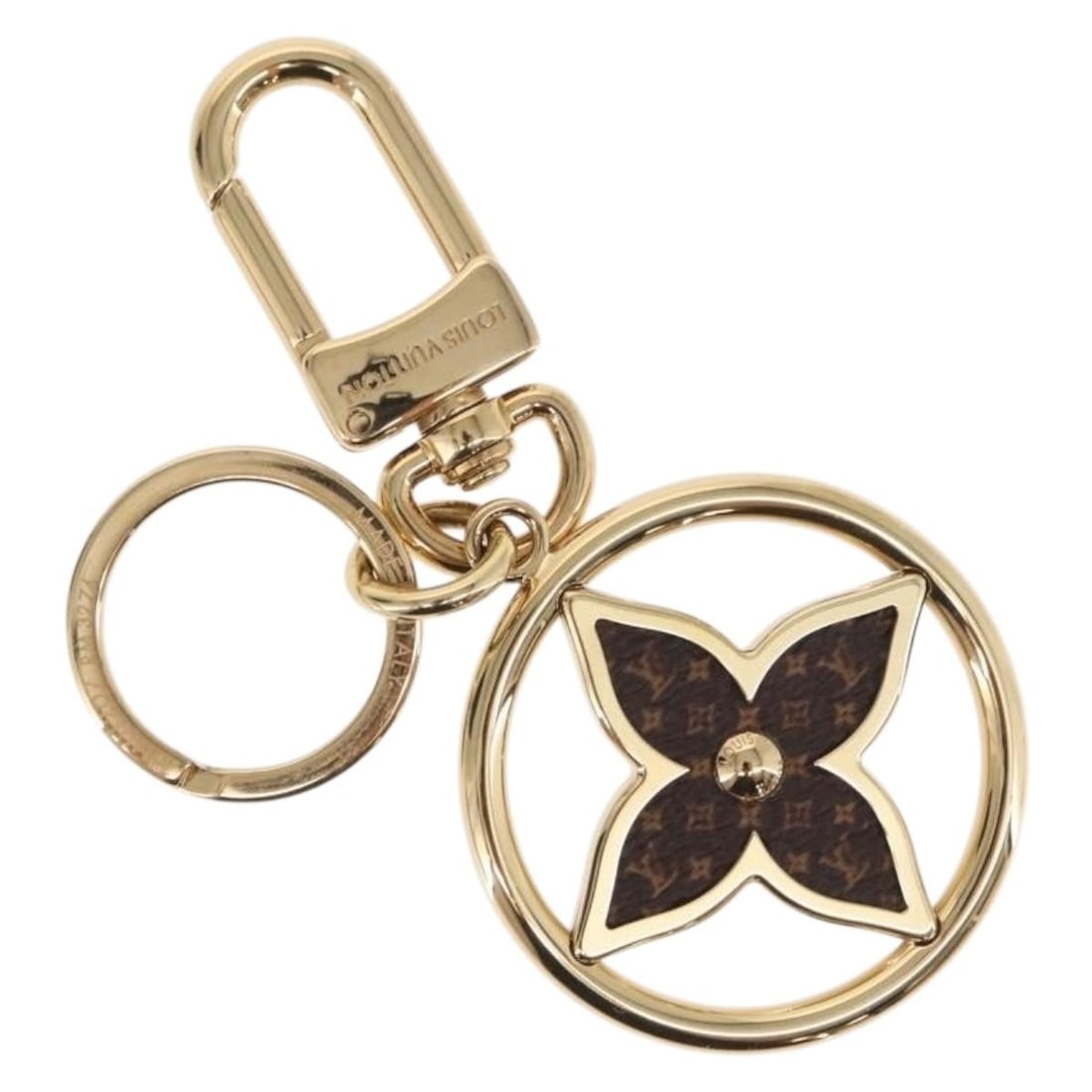 LOUIS VUITTON M01207 Key Holder Monogram Gold Metal: LOUIS VUITTON M01207 Key Holder Monogram Gold Metal This exquisite Louis Vuitton Key Holder, from the M01207 product line, is crafted from high-quality metal and showcases a stunning Monogram and gold