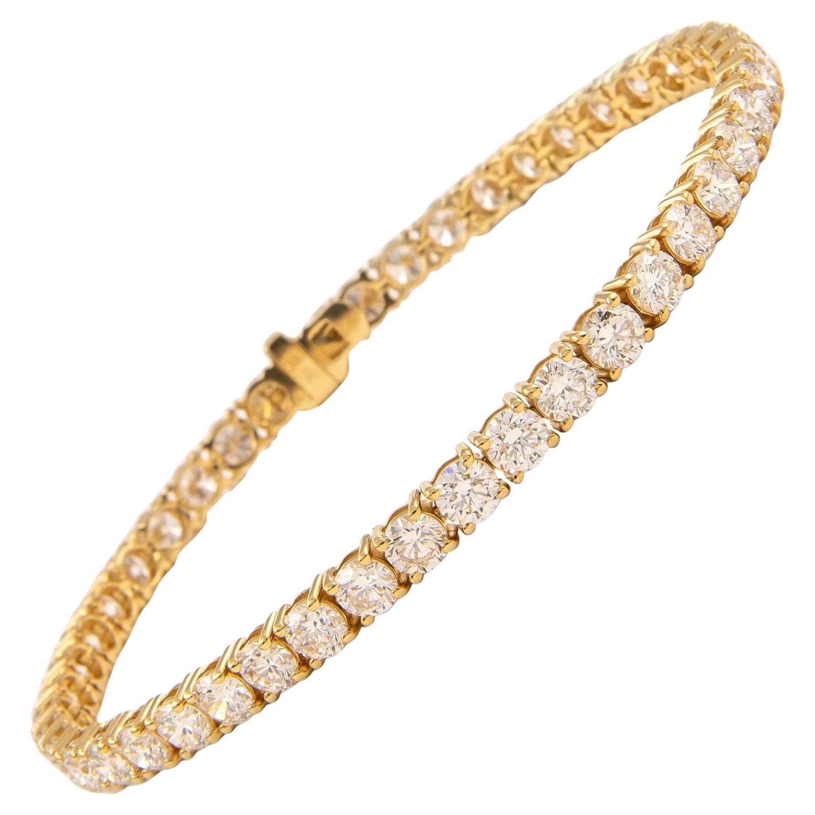 8.81ct Diamond Tennis Bracelet 18k Gold: 8.81ct Diamond Tennis Bracelet 18k Gold This exquisite diamond tennis bracelet features 48 round brilliant diamonds totaling 8.81 carats, each carefully set in luxurious 18k yellow gold. The diamonds