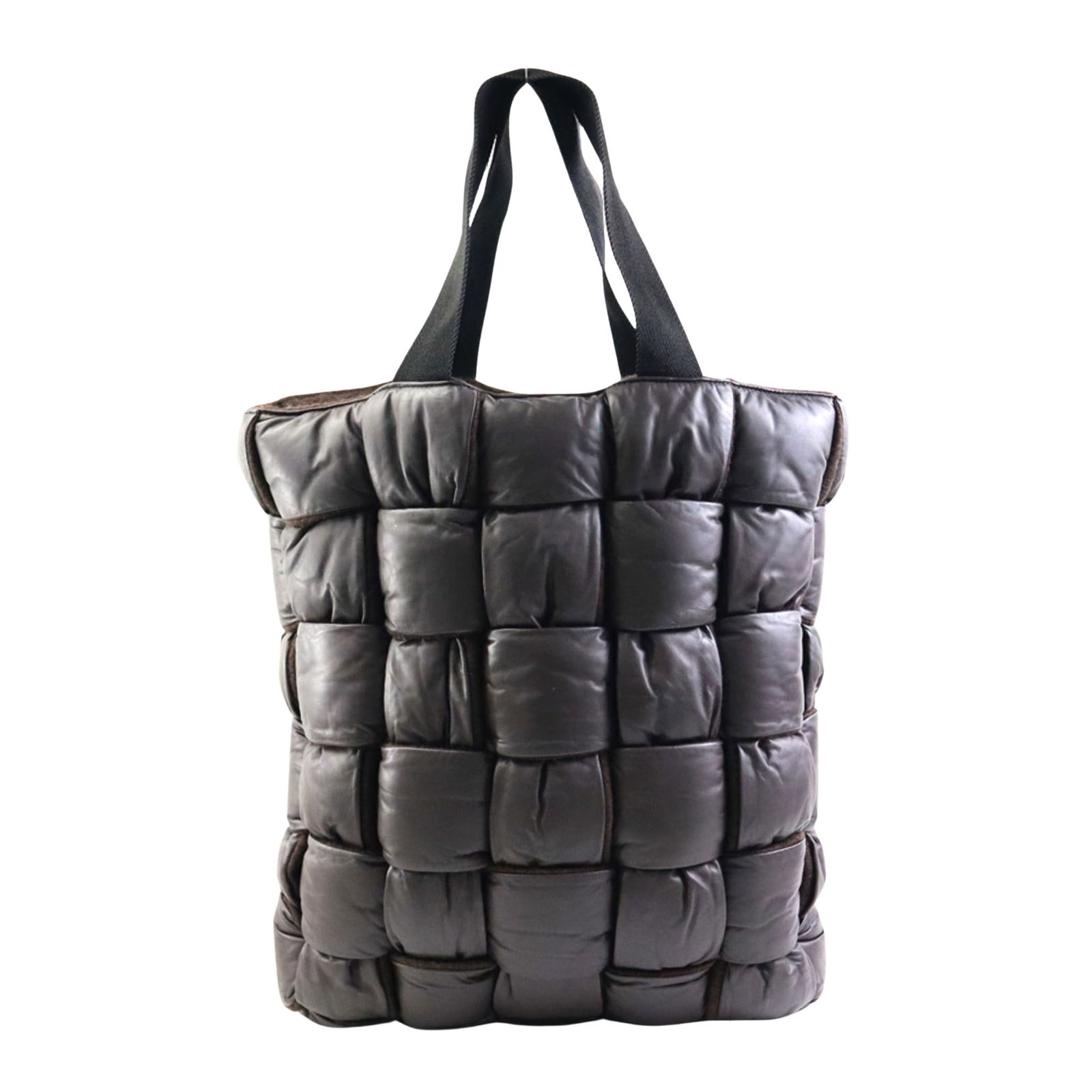 Brown Leather Cassette Shoulder Bag by Bottega Veneta for Men: Brown Leather Cassette Shoulder Bag by Bottega Veneta for Men The Bottega Veneta Cassette is a men's handbag crafted from brown leather. Designed with an open closure, it offers convenient access to c