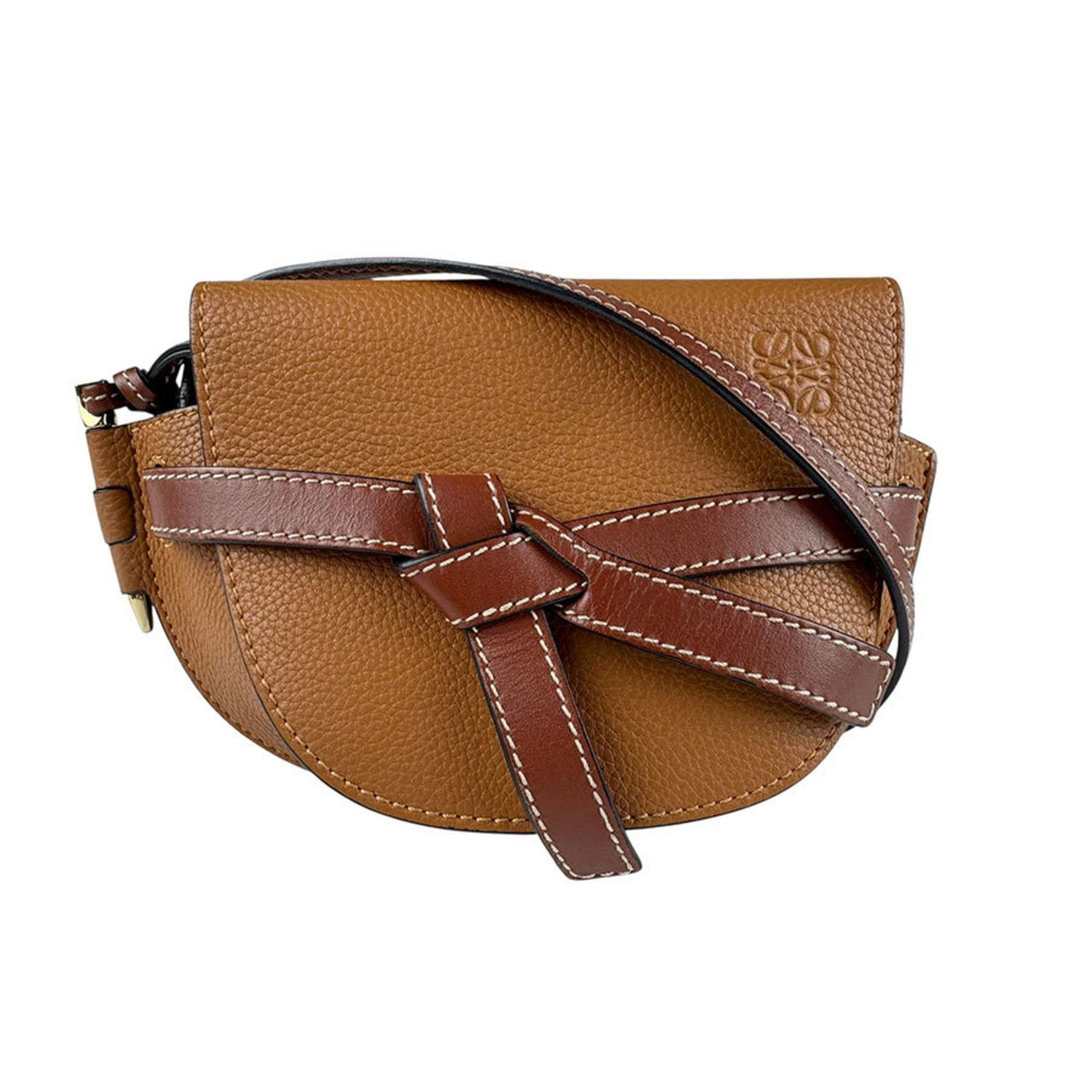 Leather Gate Bag by Loewe in Brown: Leather Gate Bag by Loewe in Brown This Loewe Gate model is a women's accessory crafted from brown leather. It features a compact design and is made in Spain. The item is in good overall condition wit