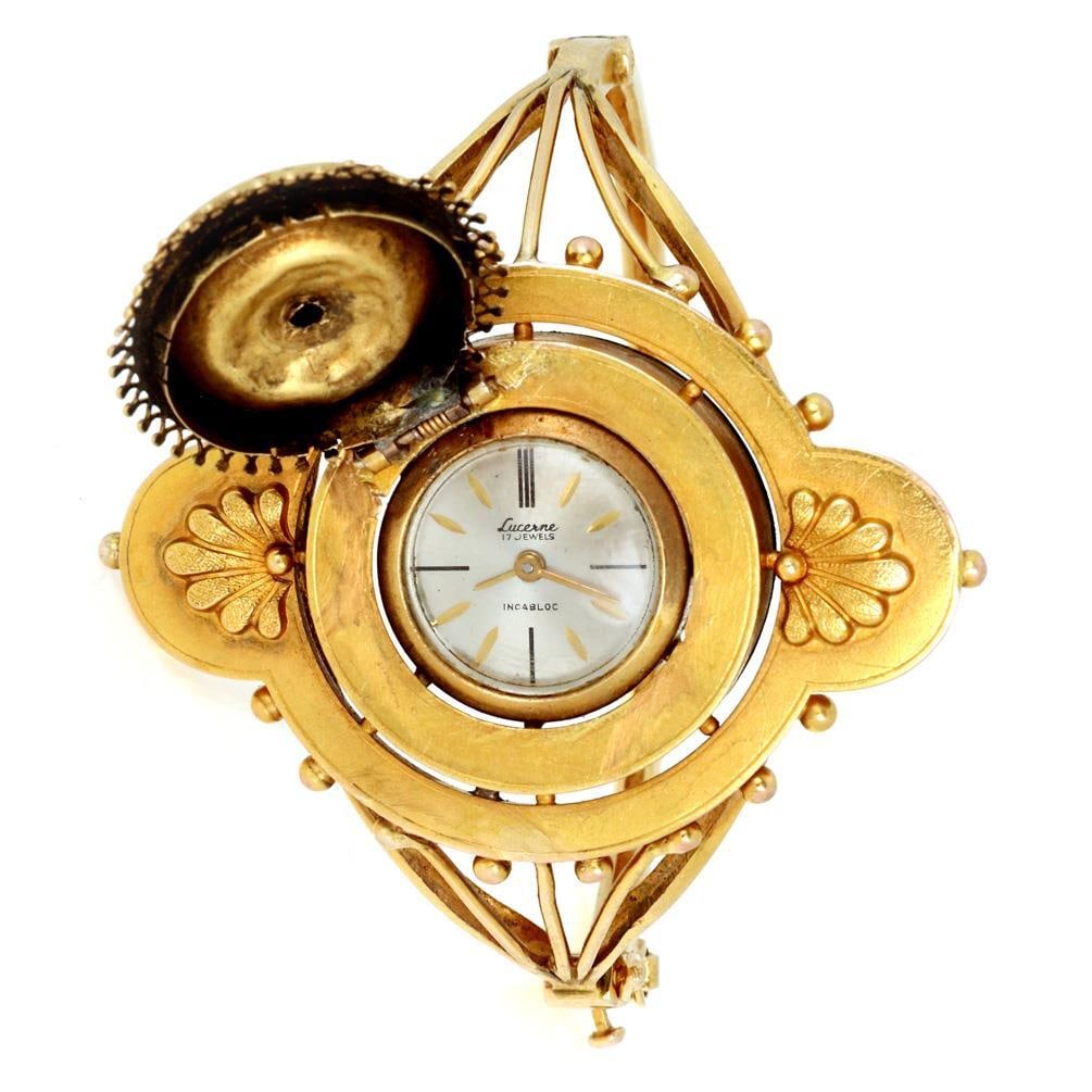 Victorian 14k Gold Enamel Hidden Lucerne Diamond Bracelet Watch: Victorian 14k Gold Enamel Hidden Lucerne Diamond Bracelet Watch This exquisite Victorian Era bracelet/watch is a remarkable piece of craftsmanship, featuring a hidden Lucerne ladies watch under a beau