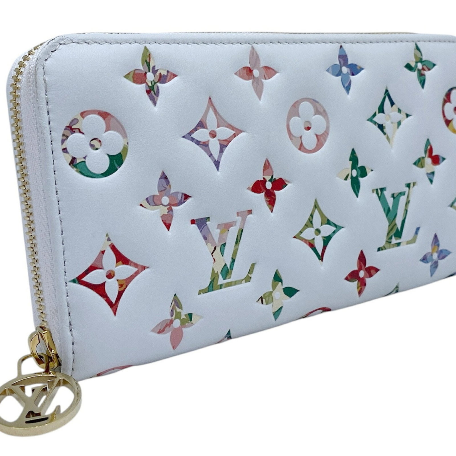 White Leather Zippy Wallet by Louis Vuitton with French Origin: White Leather Zippy Wallet by Louis Vuitton with French Origin This Louis Vuitton Zippy wallet features a sleek white leather exterior and is crafted in France. The wallet is designed with a spacious