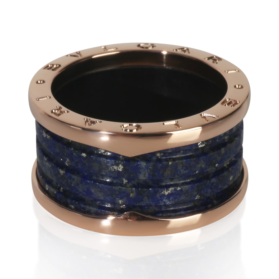 B.zero1 Collection 18k Rose Gold and Lapis Ring by BVLGARI Size 8.5: B.zero1 Collection 18k Rose Gold and Lapis Ring by BVLGARI Size 8.5 This BVLGARI B.zero1 ring features a striking lapis centerpiece set in 18k rose gold. Crafted in Italy, this unisex ring is designed