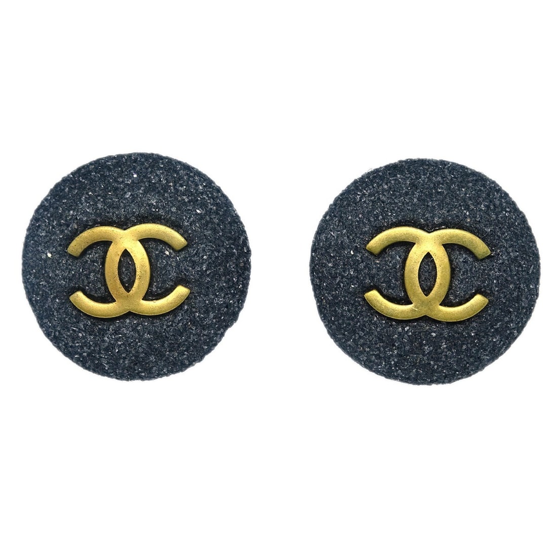 Chanel 94A Gray Round Clip-On Earrings Gold Plated: Chanel 94A Gray Round Clip-On Earrings Gold Plated Elevate your accessory collection with these exquisite Chanel Gray Button Earrings. These round clip-on earrings showcase a sophisticated gray color,