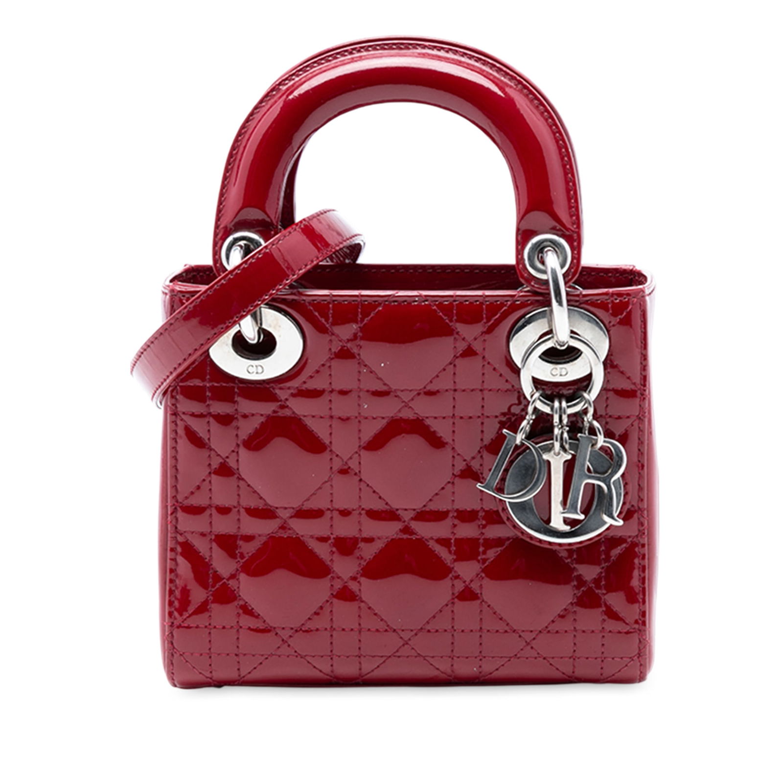 Red Mini Lady Dior Cannage Quilted Patent Leather Bag with Strap: Red Mini Lady Dior Cannage Quilted Patent Leather Bag with Strap This Mini Patent Cannage Lady Dior bag features a quilted patent leather body in red, flat top handles, and a detachable flat leather s