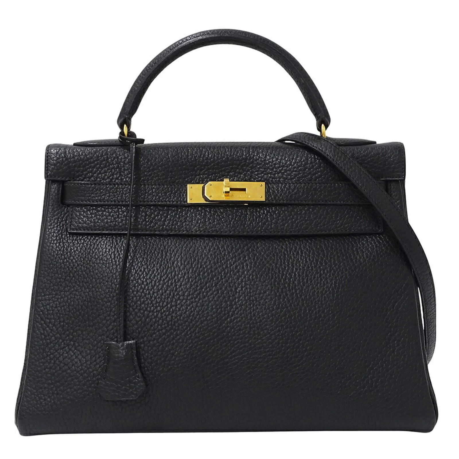 Black Leather Hermes Kelly 32 Handbag with Shoulder Strap: Black Leather Hermes Kelly 32 Handbag with Shoulder Strap The Hermes Kelly 32 is a sophisticated handbag crafted from black leather. This elegant piece is designed for women and features a classic sil