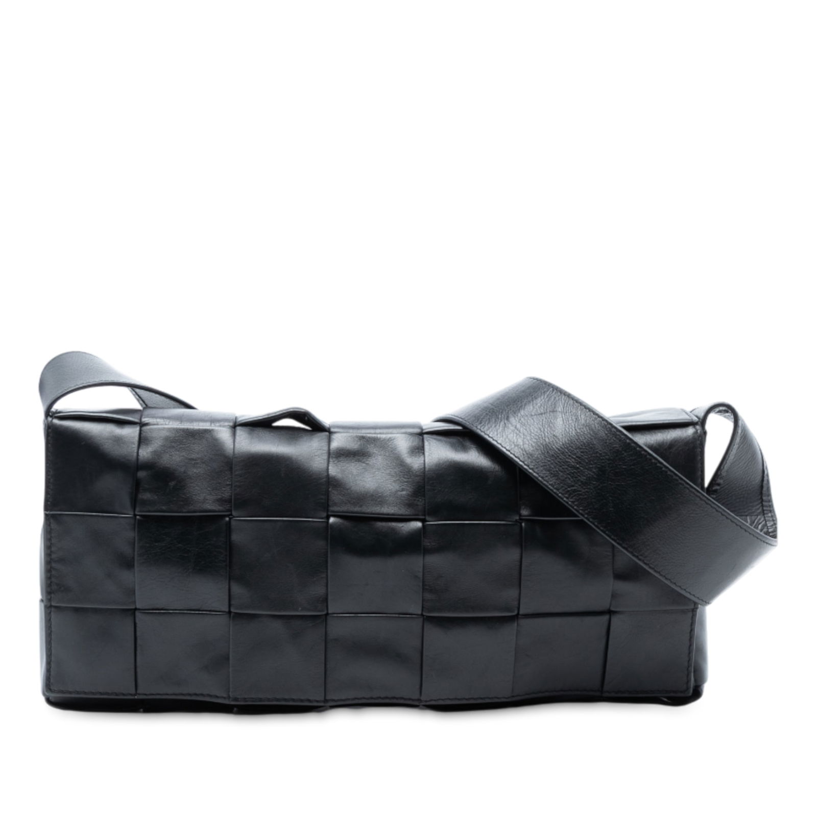 Bottega Veneta Intrecciato Cassette Crossbody Bag Black Leather: Bottega Veneta Intrecciato Cassette Crossbody Bag Black Leather The Bottega Veneta Stretch Paper Calfskin Intrecciato Cassette Crossbody is a sophisticated and stylish bag crafted from woven nappa lea