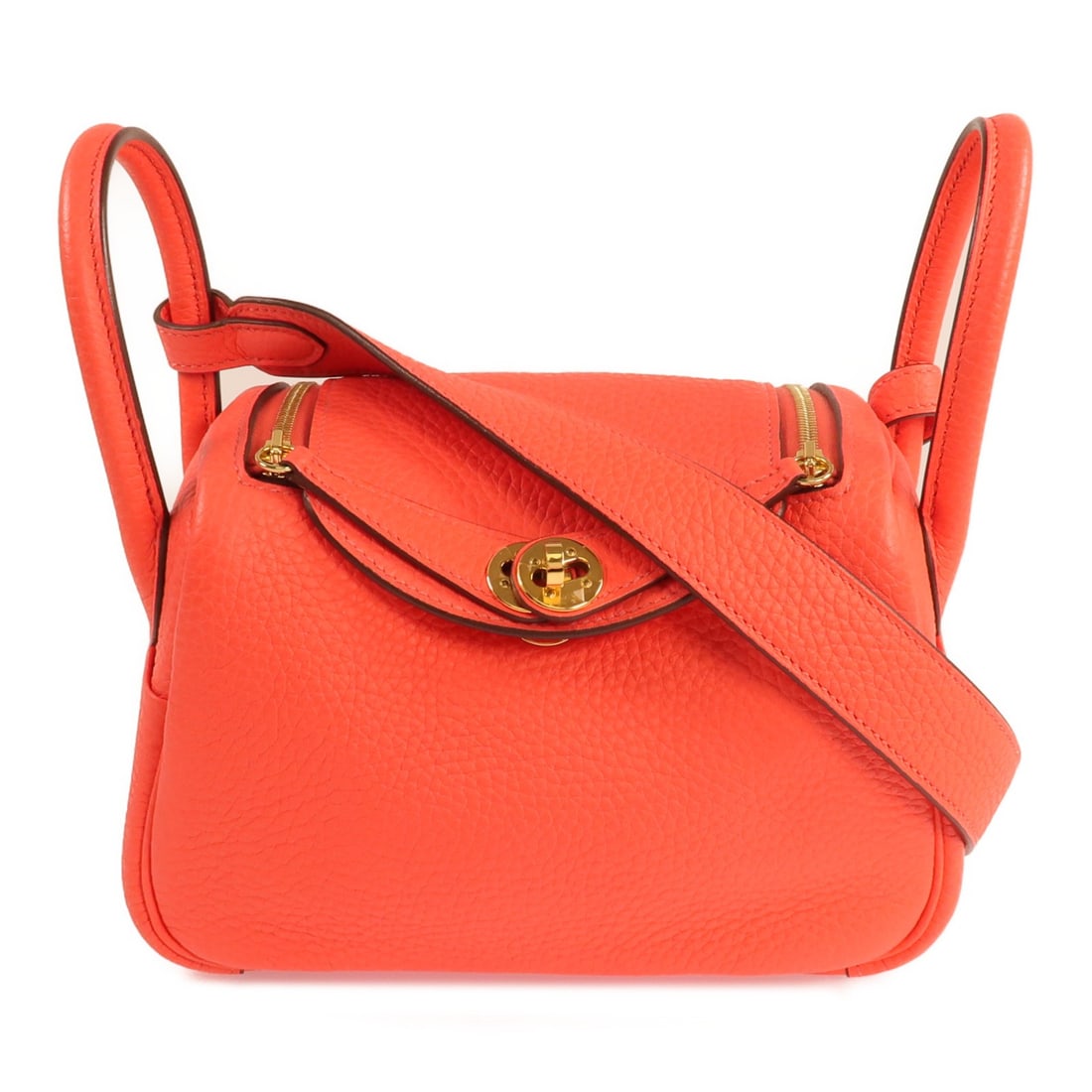 Hermes Mini Lindy Rose Tomate Clemence Leather Bag with Gold Hardware: Hermes Mini Lindy Rose Tomate Clemence Leather Bag with Gold Hardware This Hermes Mini Lindy is a versatile 2-way shoulder bag crafted from Clemence calfskin leather in a vibrant rose tomate red. It f