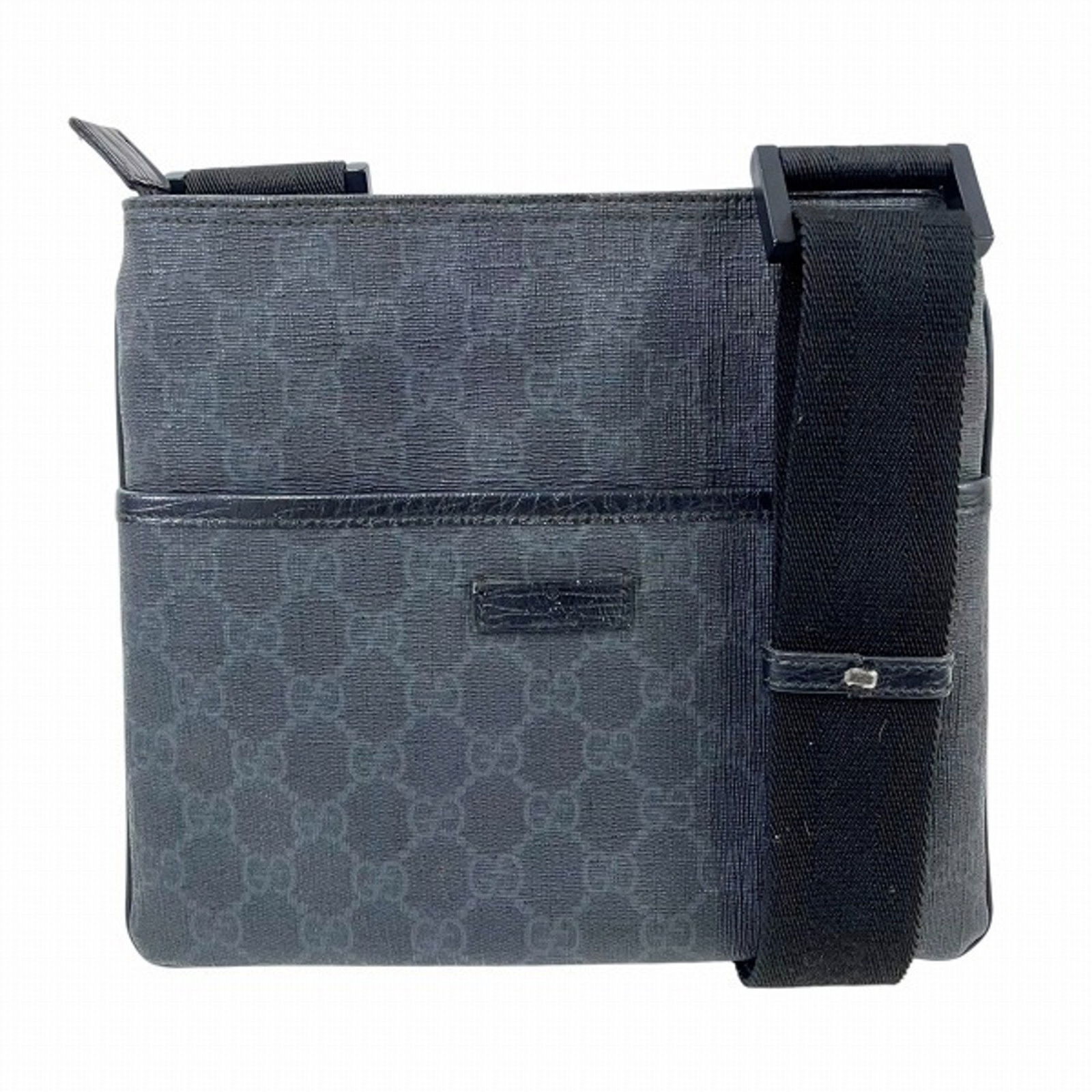 Grey Canvas Crossbody Bag Gucci GG Plus Model: Grey Canvas Crossbody Bag Gucci GG Plus Model This Gucci GG Plus bag is crafted from grey canvas and features a compact design. The bag is made in Italy and is designed for women. It shows some signs