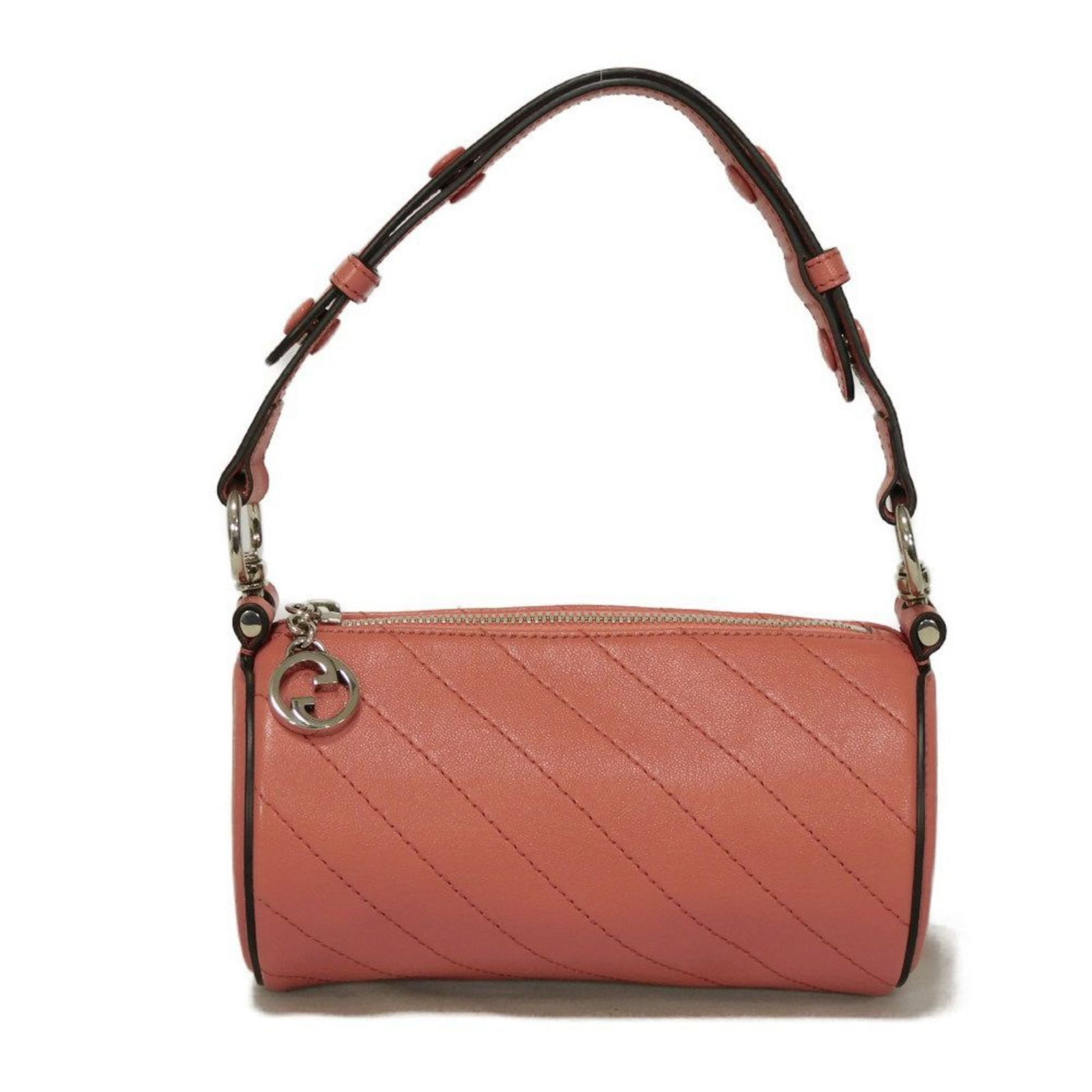 Pink leather ladies handbag by Gucci made in Italy: Pink leather ladies handbag by Gucci made in Italy This Gucci handbag features a pink leather exterior and is designed for women. The bag shows slight out-of-shape wear on the outside, while the inter