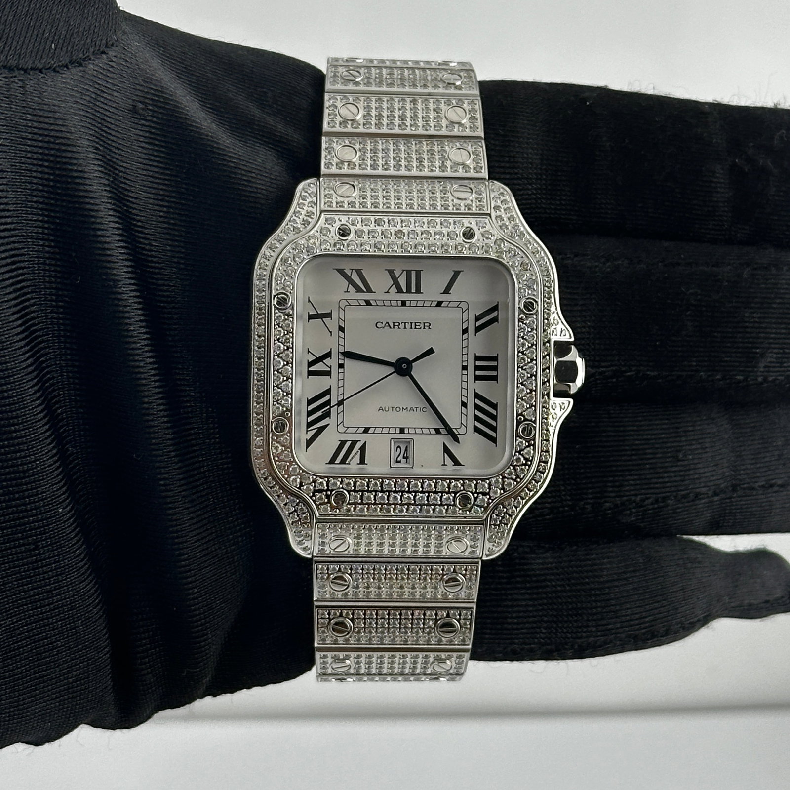 Diamond Bezel Cartier Santos Ref 4072 Silver Roman Dial Watch: Diamond Bezel Cartier Santos Ref 4072 Silver Roman Dial Watch This Cartier Santos watch features a silver Roman numeral dial, a diamond-set bezel, and a diamond bracelet. It is designed for men and is
