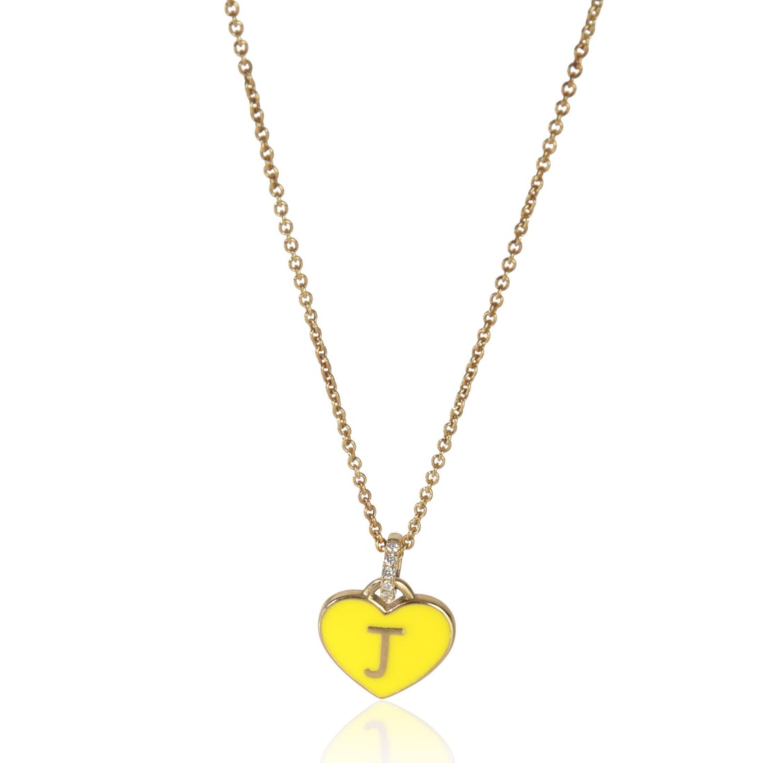 14K Yellow Gold Heart Pendant With J Initial and Diamond Accents: 14K Yellow Gold Heart Pendant With J Initial and Diamond Accents This women's pendant features a yellow enamel heart design with the initial 'J', crafted in 14K yellow gold. The pendant is accented wi