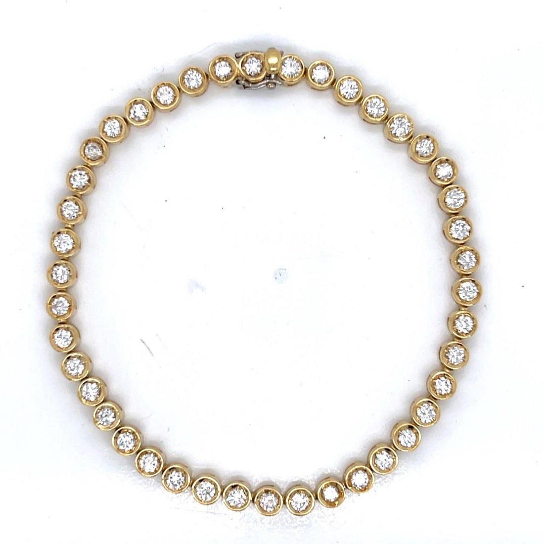18K Yellow Gold 3.00 Ct Diamond Tennis Bracelet 42 Stones: 18K Yellow Gold 3.00 Ct Diamond Tennis Bracelet 42 Stones This exquisite 18K Yellow Gold Tennis Bracelet features a stunning arrangement of 42 diamonds, totaling approximately 3.00 carats. The diamond