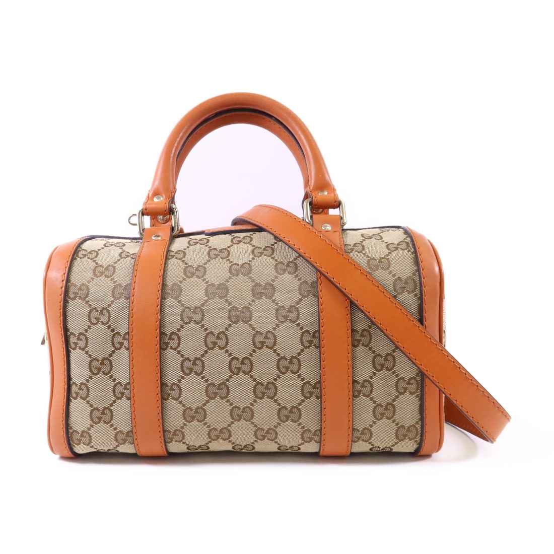 Gucci GG Canvas Brown Orange Boston 2-Way Bag with Gold Hardware: Gucci GG Canvas Brown Orange Boston 2-Way Bag with Gold Hardware This Gucci 2-way Boston bag features the iconic GG canvas in a brown and orange color scheme. It is designed for versatile use, functio