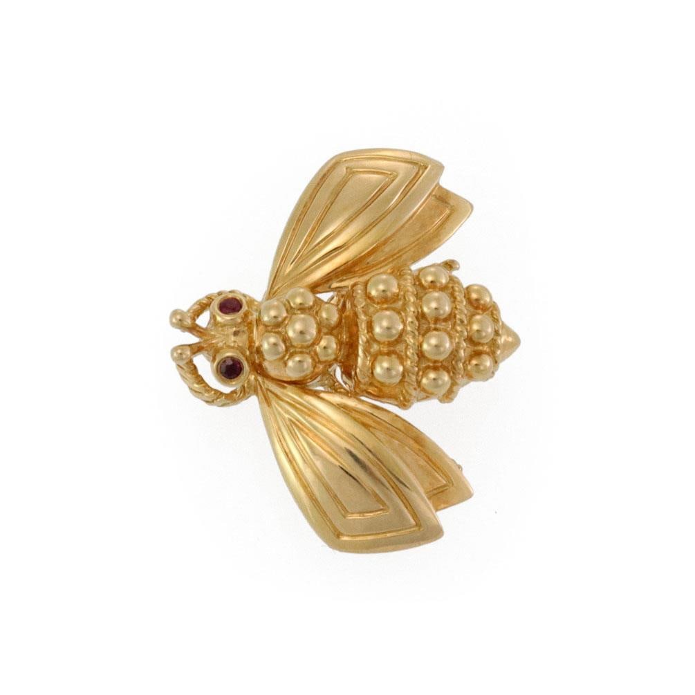 Tiffany & Co. 18k Yellow Gold Ruby Bee Brooch Pin: Tiffany & Co. 18k Yellow Gold Ruby Bee Brooch Pin This exquisite Tiffany & Co. bee brooch pin is crafted from 18k yellow gold, showcasing a polished finish. The design features a charming bee with dou