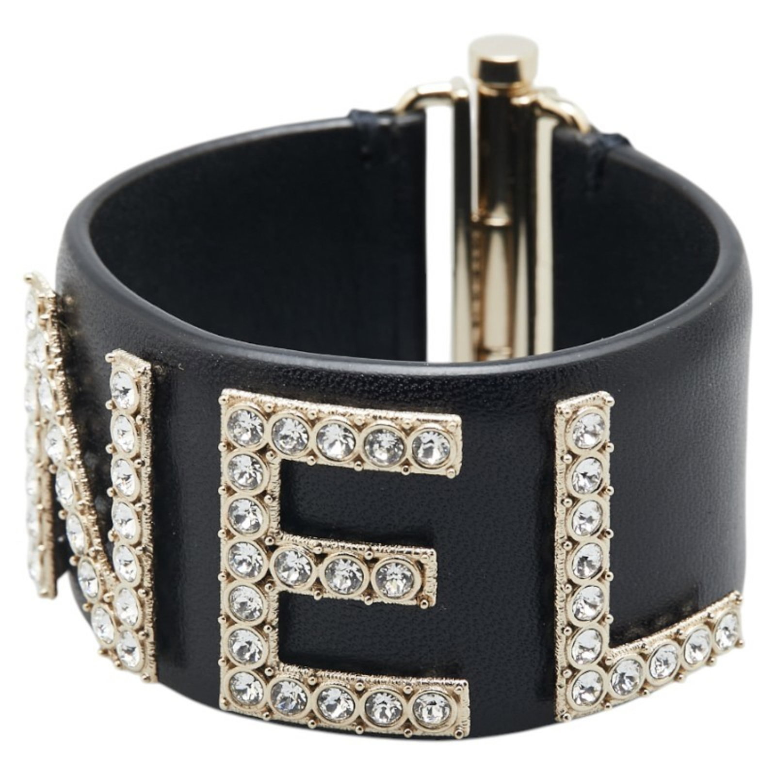 Black leather women's accessory from Chanel Italy 14 cm: Black leather women's accessory from Chanel Italy 14 cm This Chanel item is crafted from black leather and designed for women. It features a length of 14 cm and is made in Italy. The item shows slight