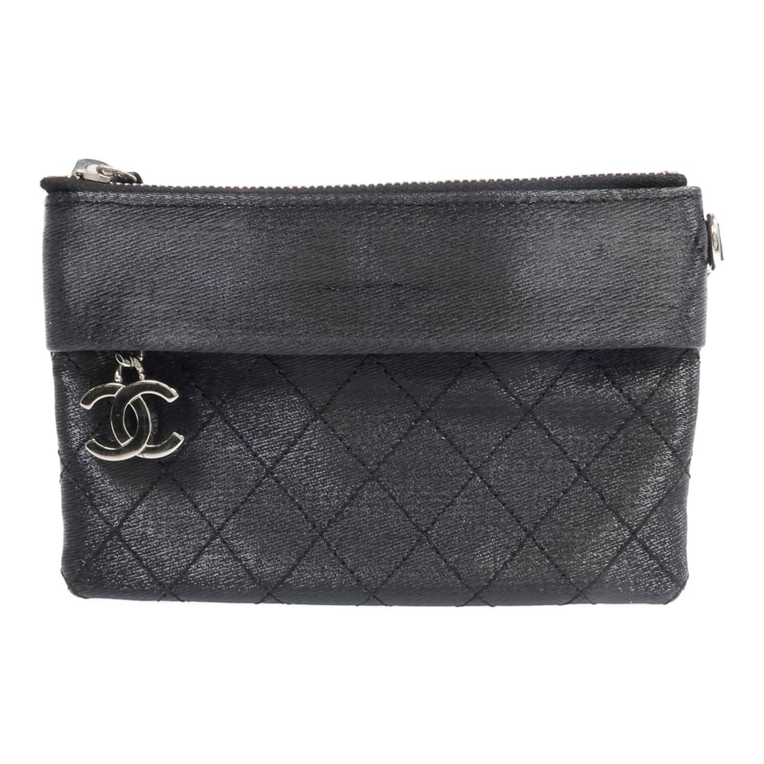 Black Canvas Pouch by CHANEL with Silver Tone CC Logo: Black Canvas Pouch by CHANEL with Silver Tone CC Logo This CHANEL pouch features a classic black canvas exterior and a sleek, compact design. Crafted in France, it offers a stylish and practical way t