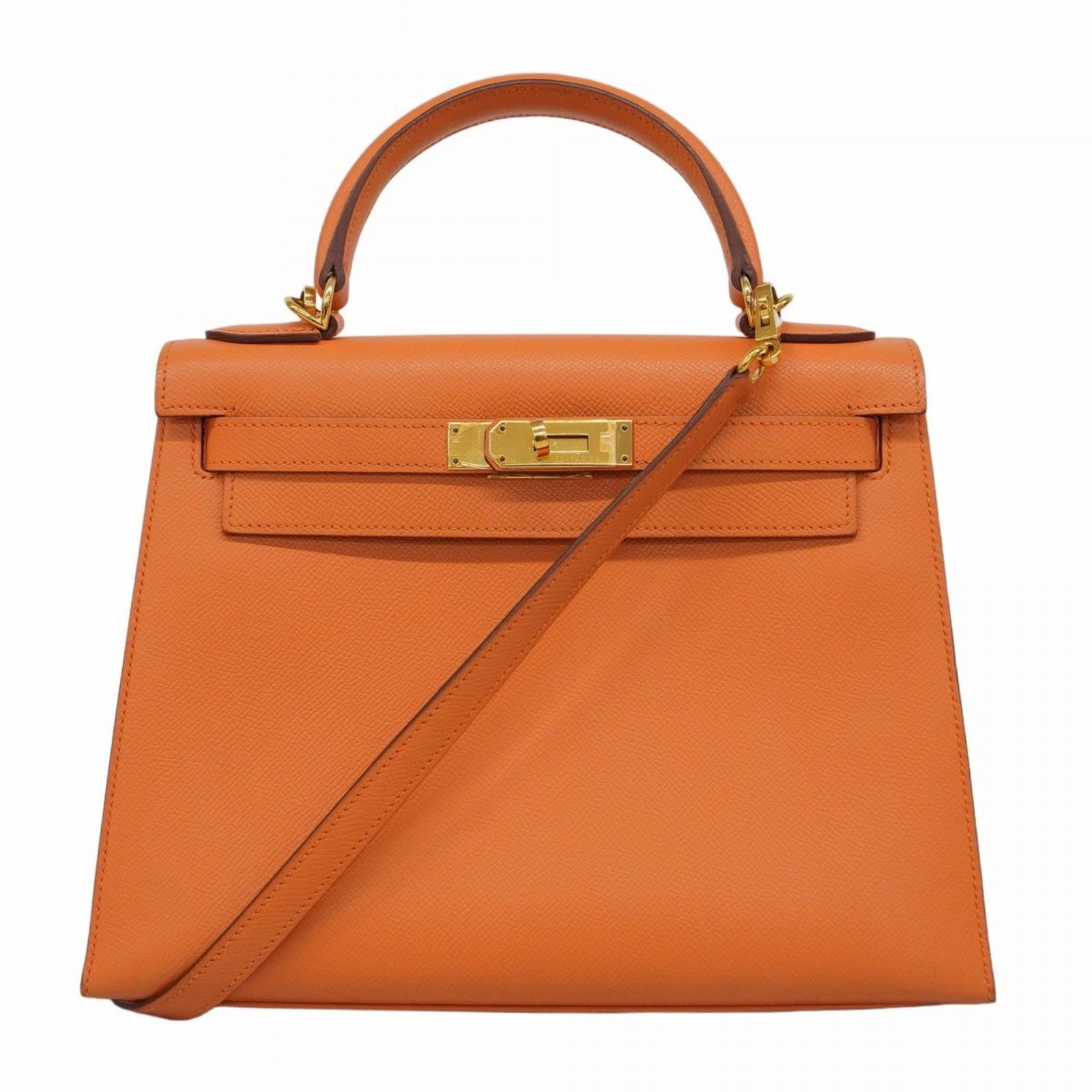 Orange Leather Hermes Kelly 28 Bag Made in France: Orange Leather Hermes Kelly 28 Bag Made in France This Hermes Kelly 28 handbag is crafted from orange leather and designed for women. It features a structured silhouette with dimensions of 22cm x 29cm