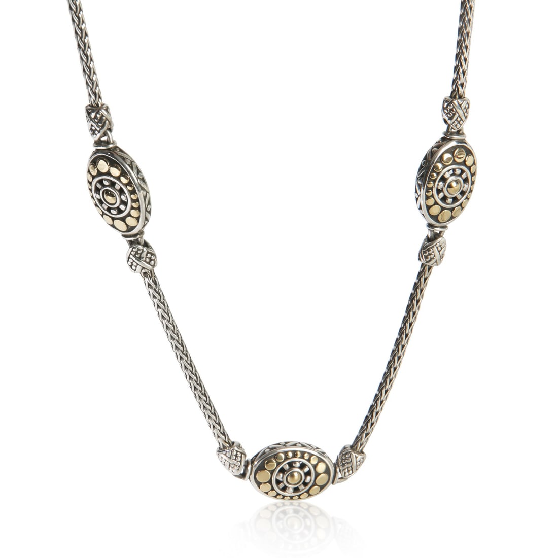 Dot Station Necklace in 18K Yellow Gold and Sterling Silver by John Hardy: Dot Station Necklace in 18K Yellow Gold and Sterling Silver by John Hardy This John Hardy Dot Station necklace features a blend of yellow gold and sterling silver, crafted in Indonesia. The necklace i