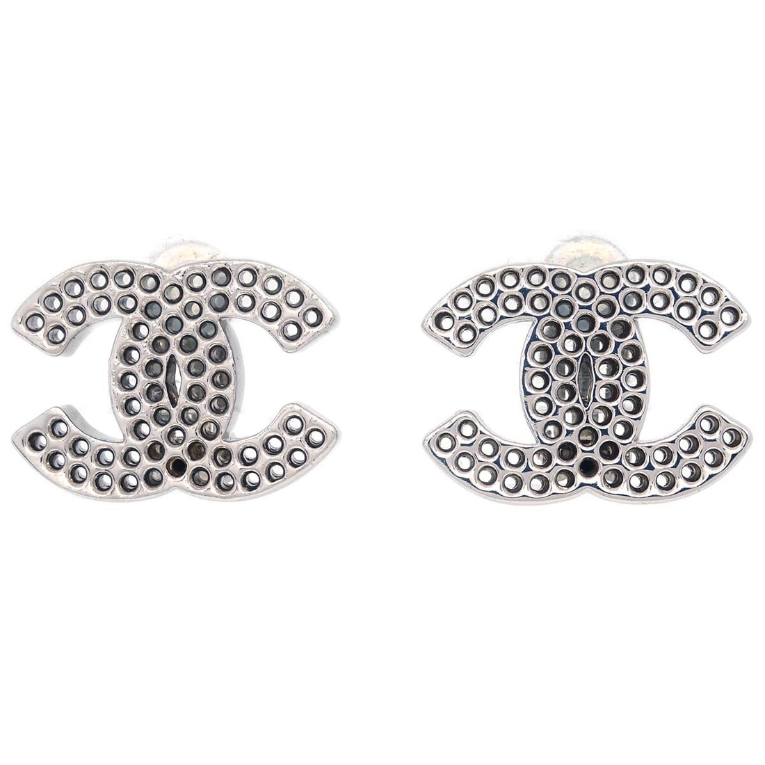 Chanel CC Clip-On Earrings Silver Plated Button Style: Chanel CC Clip-On Earrings Silver Plated Button Style Enhance your accessory collection with these stunning Chanel CC Clip-On Earrings. Crafted in a sleek silver-plated finish, these button-style earr