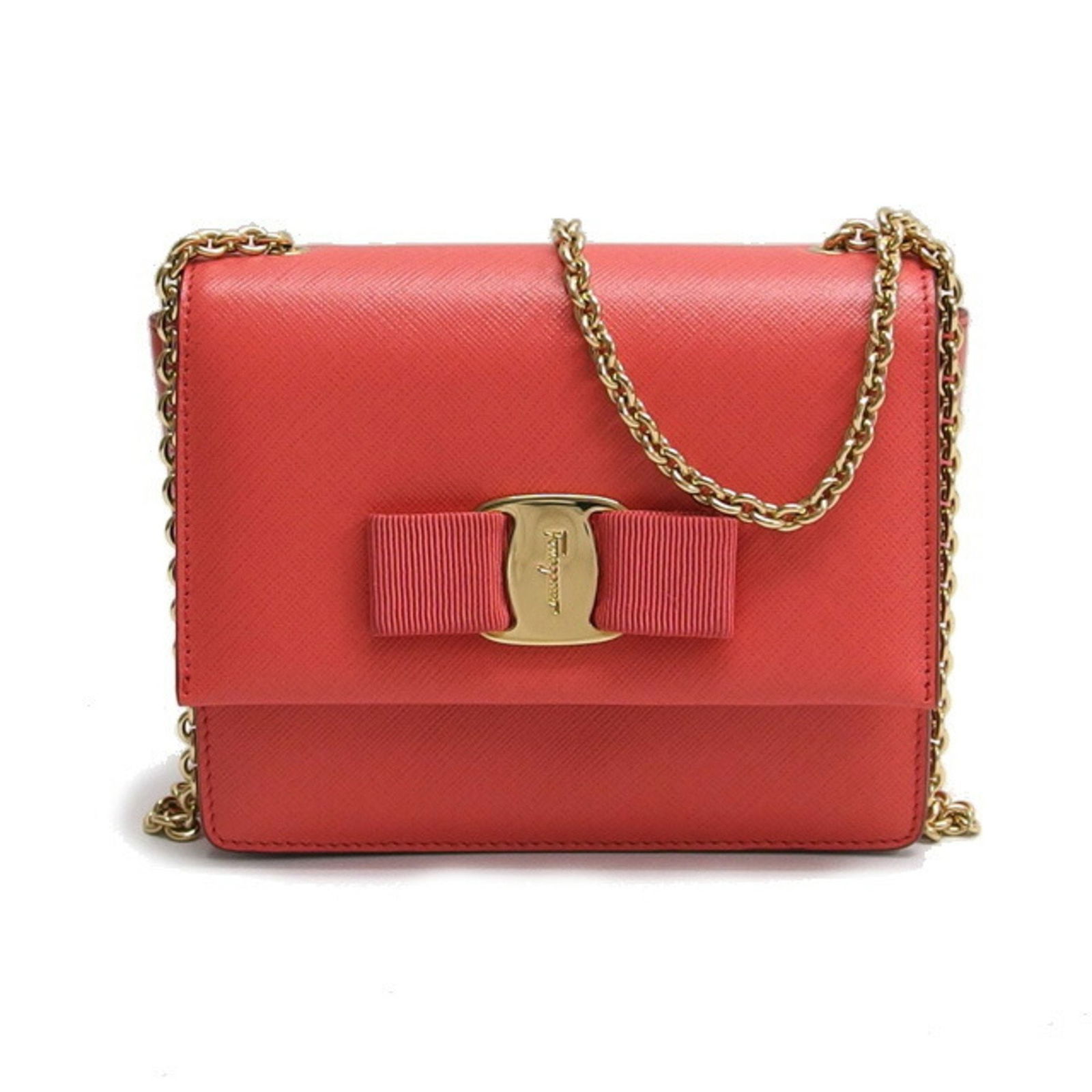 Pink Leather Ginny Shoulder Bag by Salvatore Ferragamo: Pink Leather Ginny Shoulder Bag by Salvatore Ferragamo This Salvatore Ferragamo Ginny bag is crafted from pink leather and features a compact and elegant design. Made in Italy, it is designed for wome