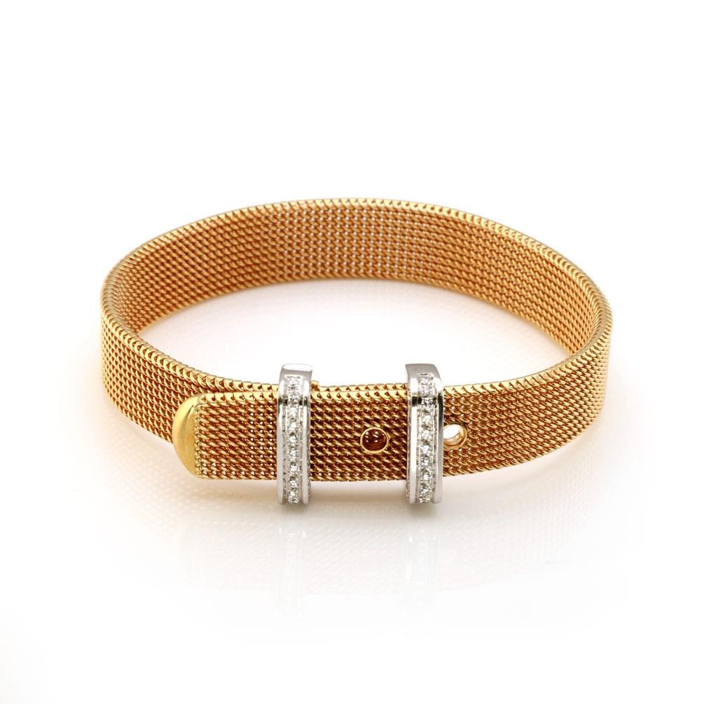 Elegant 18k Gold Diamond Mesh Buckle Bracelet 11mm Wide: Elegant 18k Gold Diamond Mesh Buckle Bracelet 11mm Wide This stunning bracelet is expertly crafted from 18k yellow and white gold. It showcases a flexible mesh belt band measuring 11mm wide, adorned w