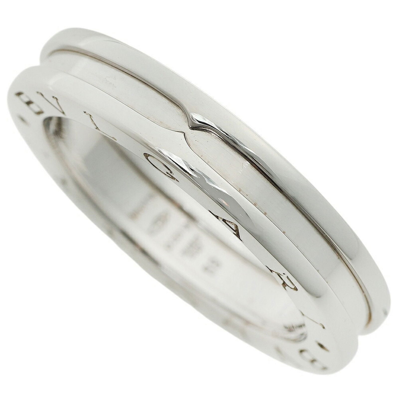 B.Zero1 ring in white gold by Bulgari: B.Zero1 ring in white gold by Bulgari This Bulgari B.Zero1 ring is crafted from white gold in a silver hue and is designed for women. The ring is a size 9.5 and originates from Italy. It has been poli