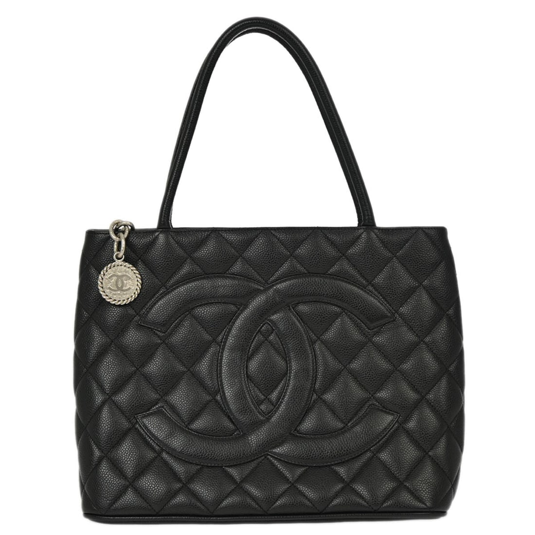 Chanel Black Caviar Skin Medallion Tote Handbag: Chanel Black Caviar Skin Medallion Tote Handbag Introducing the Chanel Black Calfskin Medallion Tote Handbag, a stylish and practical accessory perfect for casual occasions. Crafted from high-quality