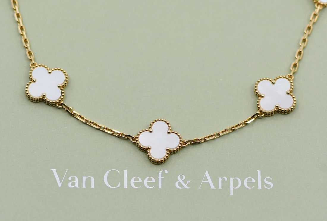 Van Cleef & Arpels Vintage Alhambra 10 Motif 18K Yellow Gold Pendant Necklace: Van Cleef & Arpels Vintage Alhambra 10 Motif 18K Yellow Gold Pendant Necklace This exquisite Van Cleef & Arpels Vintage Alhambra necklace features a stunning 10 motif design crafted in luxurious 18K y