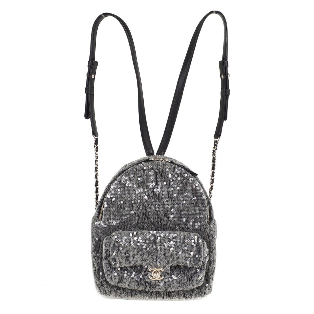 Chanel Clear Black Sequins Leather Backpack Italy: Chanel Clear Black Sequins Leather Backpack Italy Introducing the Chanel Clear Black Sequins Waterfall Backpack, an exquisite blend of style and functionality. This small-sized backpack is perfect for